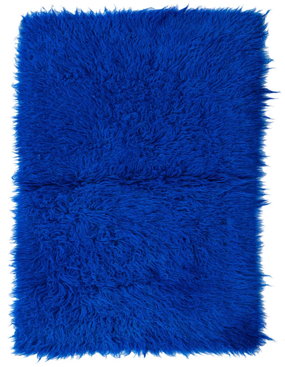 A vibrant 3x4 rectangular shag rug in a deep blue color, featuring a plush, high pile texture.
