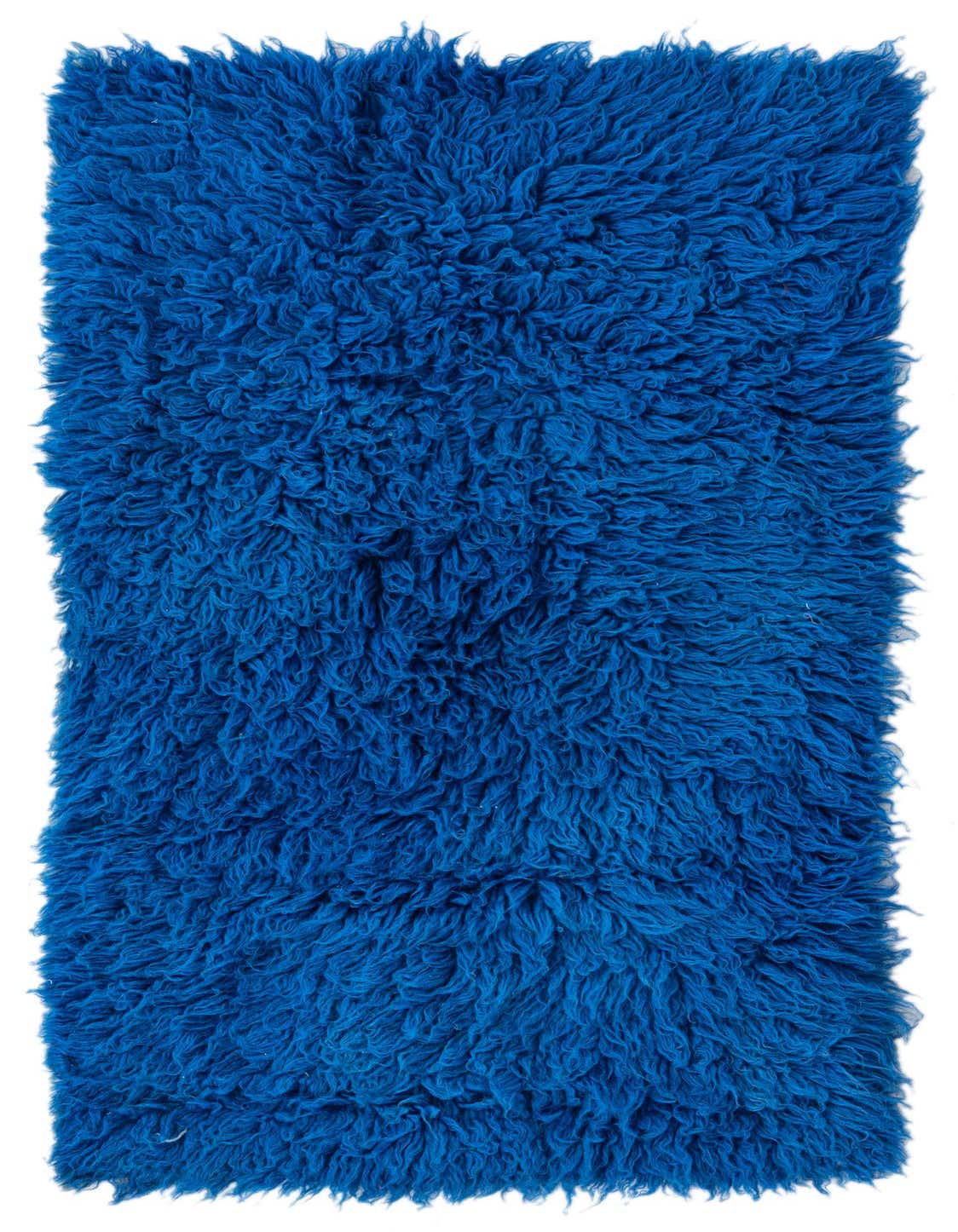 A vibrant 3x4 rectangular blue shag rug, handmade from wool, featuring a plush, textured pile.