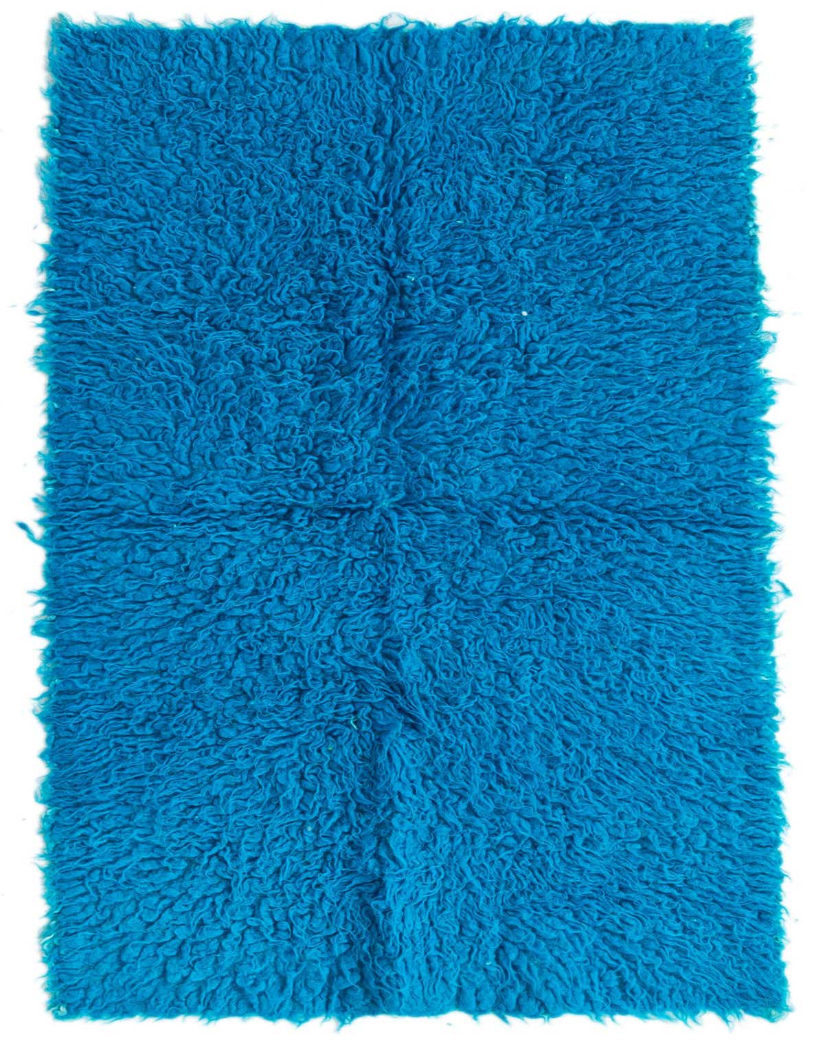 A rectangular 3x4 blue shag rug with a thick, plush pile, handmade from wool, ideal for indoor spaces.