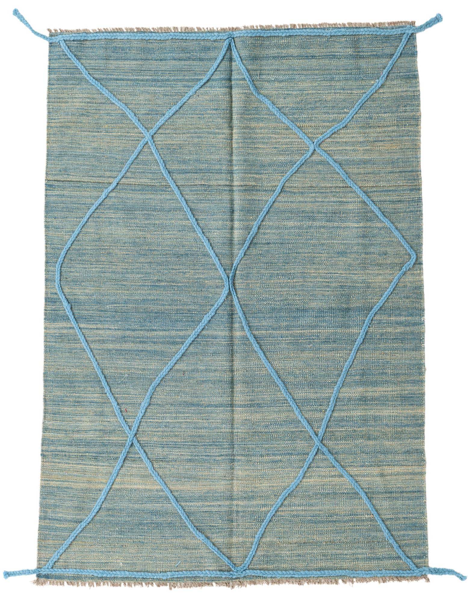 A 4x6 rectangular blue wool shag rug with a light blue diamond tribal pattern, handmade for indoor use.