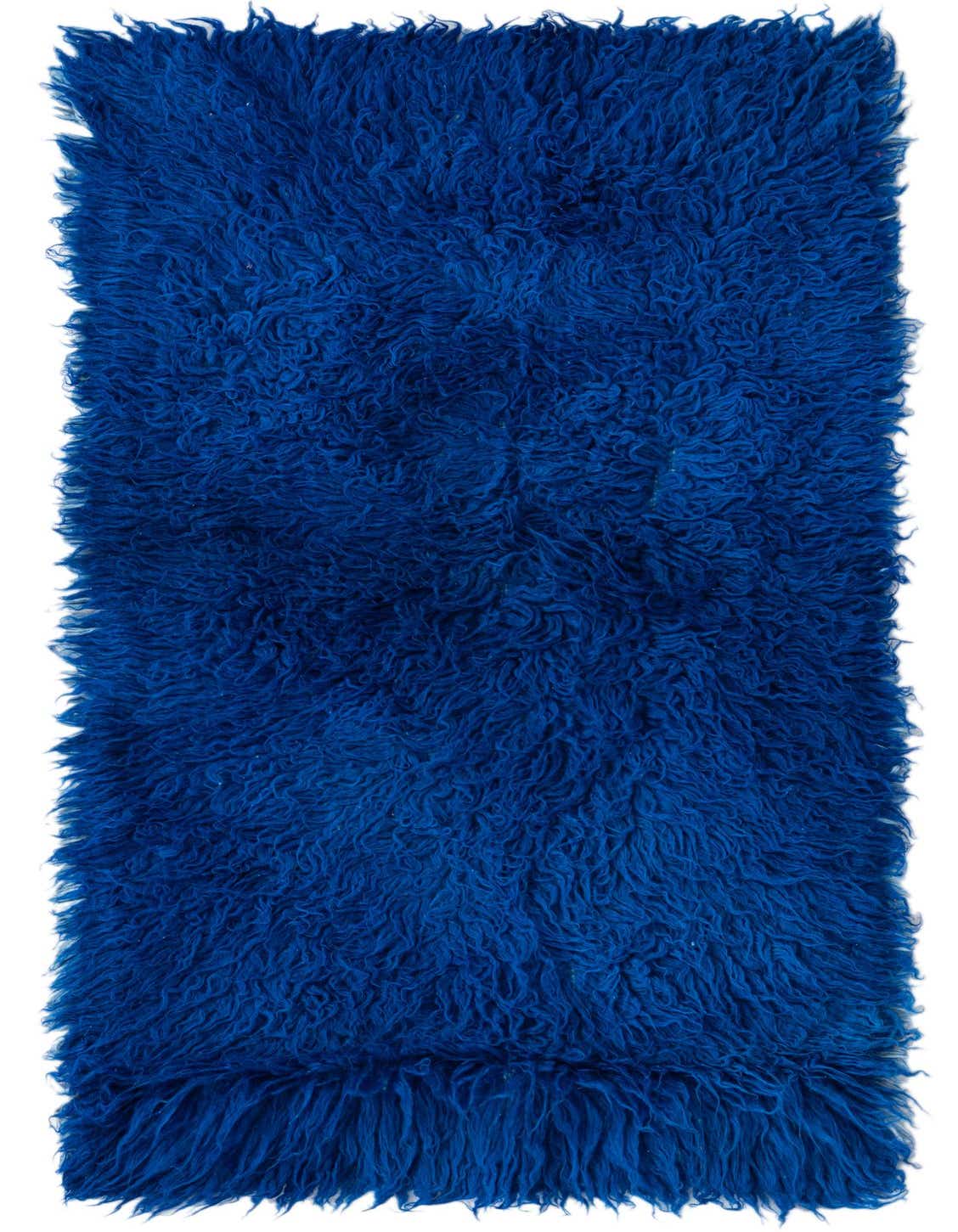 A vibrant 3x5 rectangular blue shag area rug with a thick, plush pile, perfect for adding texture.