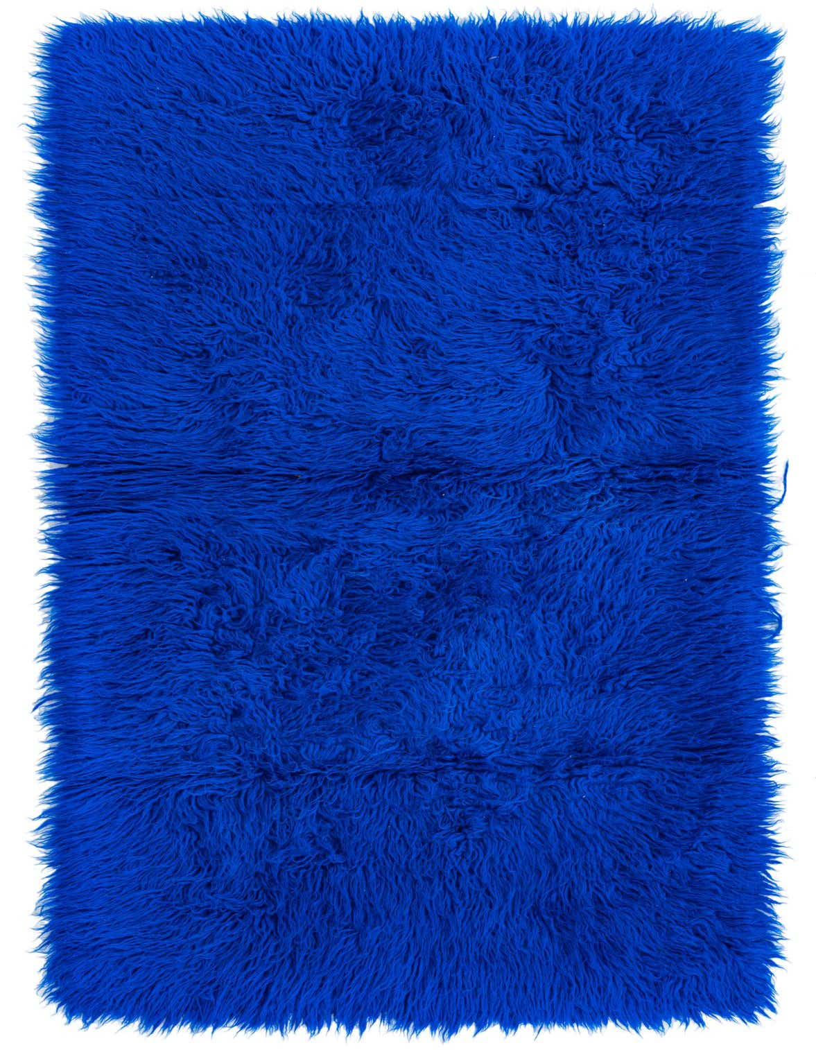A vibrant 3x5 rectangular blue shag rug with a plush, high pile, perfect for adding texture.