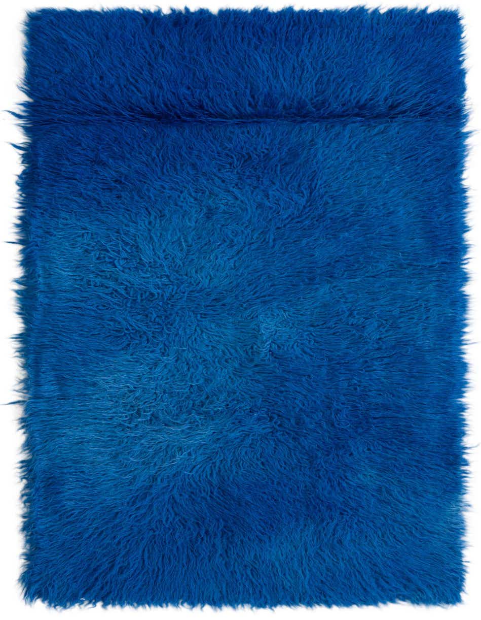 A vibrant 3x5 rectangular blue shag rug with a thick, plush pile, perfect for adding warmth and color to an indoor space.