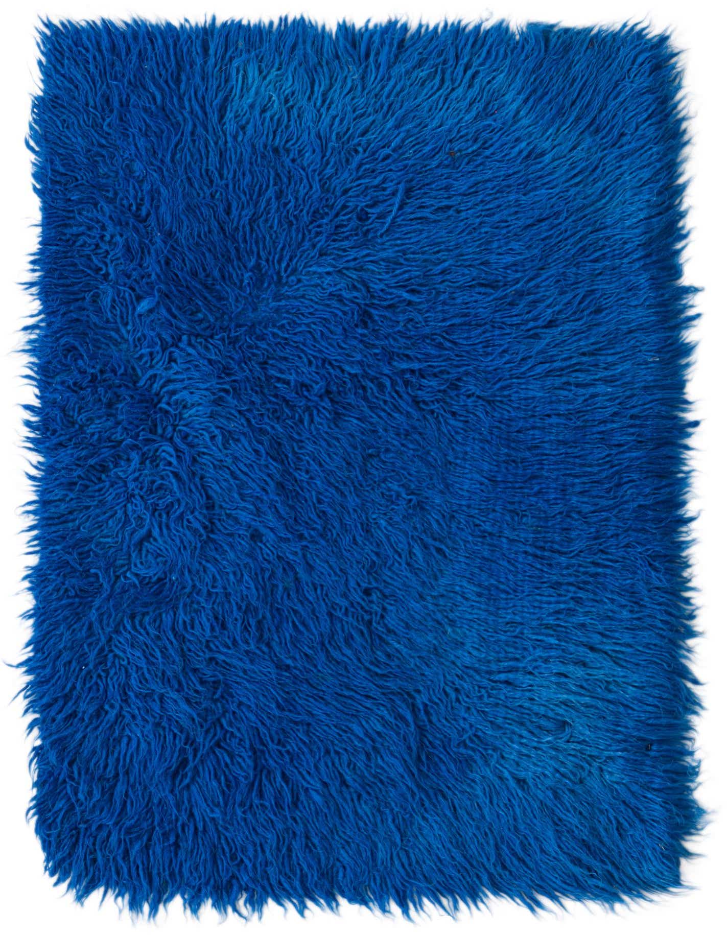 A vibrant 2x3 rectangular blue shag rug with a thick, plush pile, perfect for adding texture.