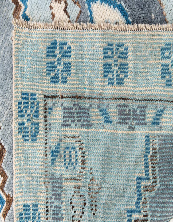 Detail image of  5' x 9'  Hand Knotted Moroccan Wool Rug