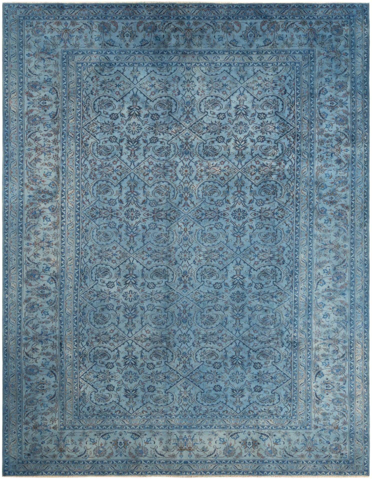 A 10x14 rectangular blue traditional wool rug with intricate floral and medallion patterns, handmade with a thin pile.