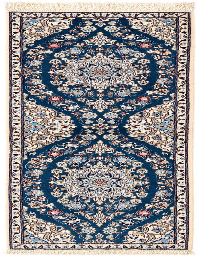 A handmade rectangular Persian rug featuring a rich blue background with intricate floral medallions and a detailed border in cream, light blue, and pink.
