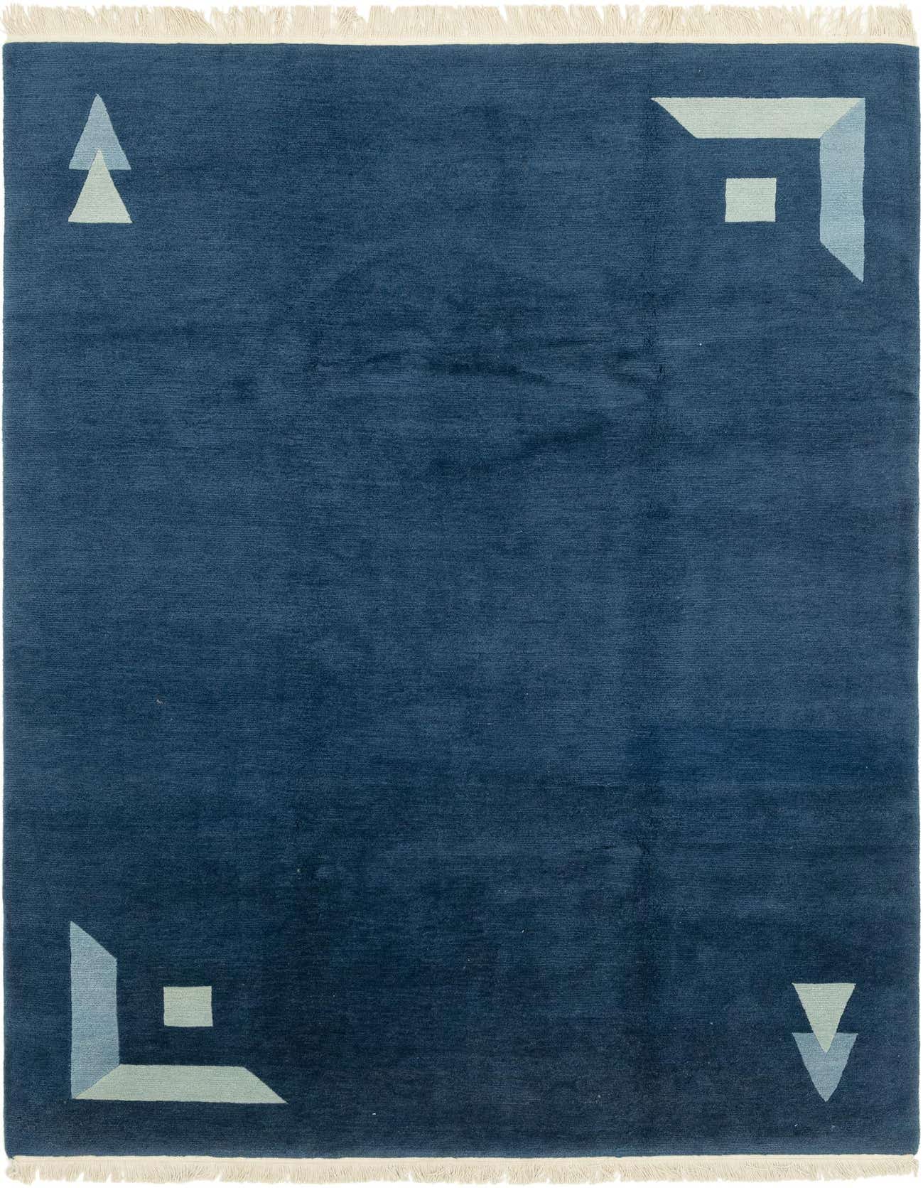 A 7x10 rectangular blue wool rug with a modern abstract pattern featuring light blue geometric shapes in each corner.