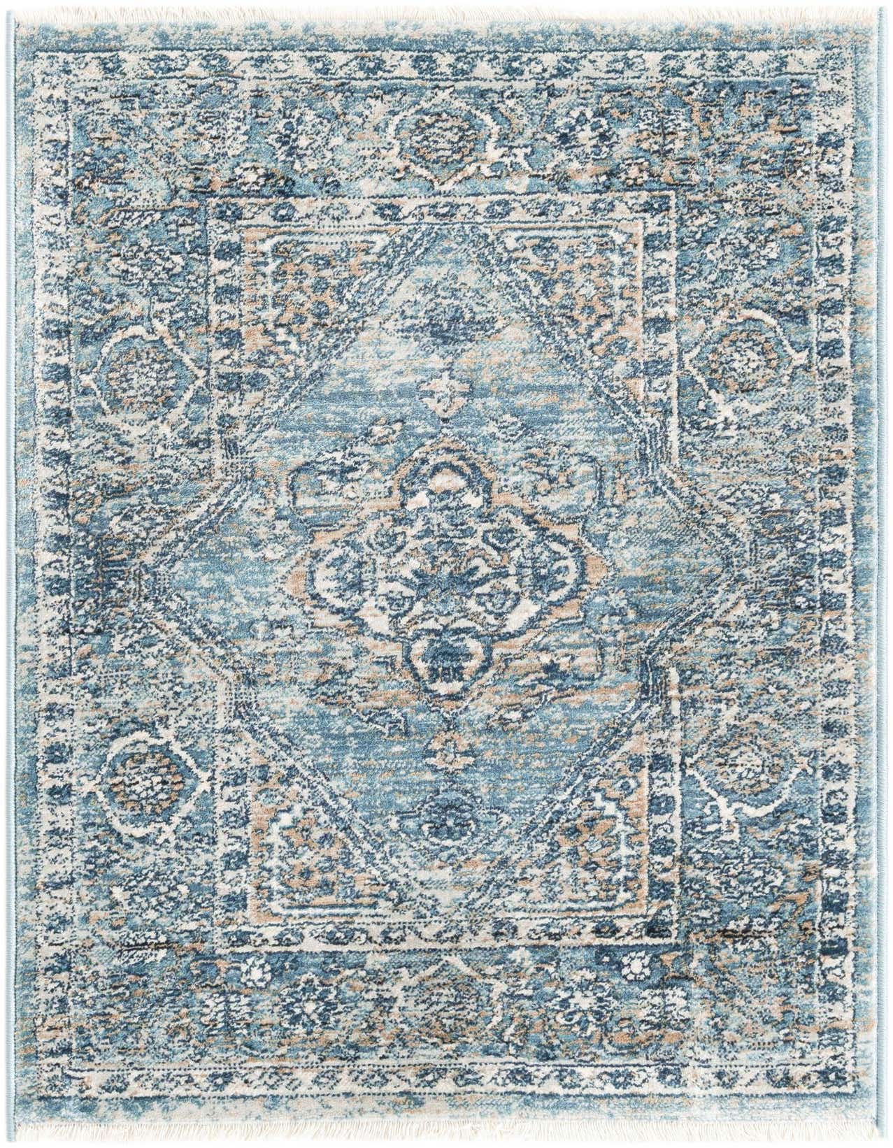 A 2x3 rectangular Newport rug featuring a distressed blue, cream, and beige Oriental medallion pattern with fringe.