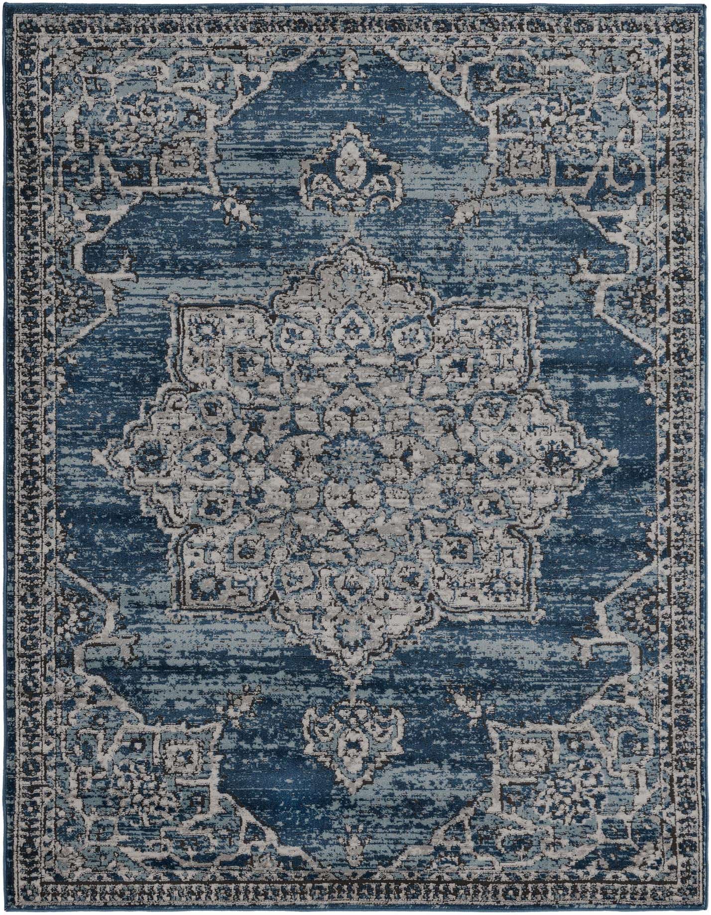 A 5x8 rectangular Nyla rug in shades of blue and gray with a distressed traditional medallion pattern.