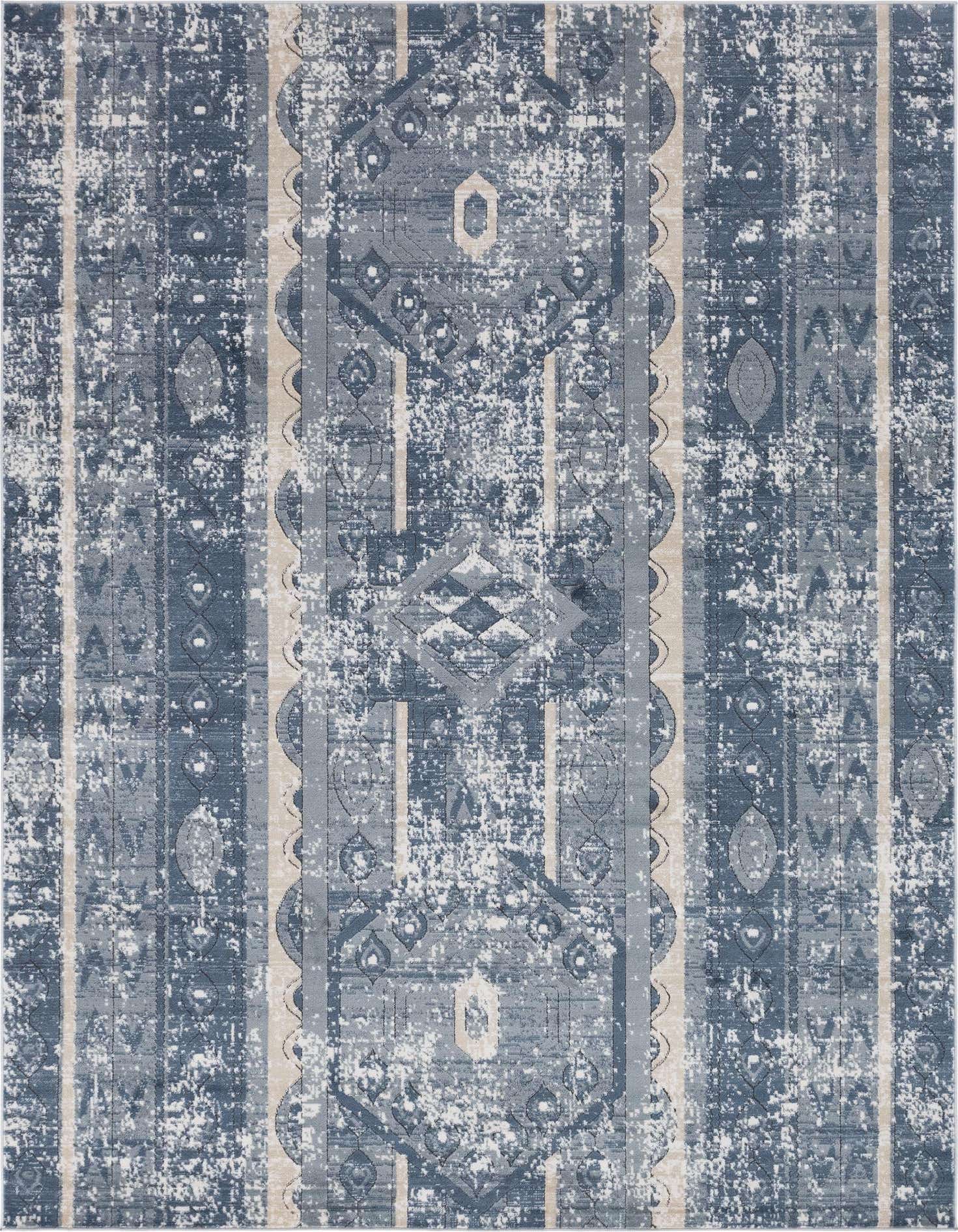 An 8x11 rectangular blue and beige area rug with a distressed bohemian stripe and tribal pattern.