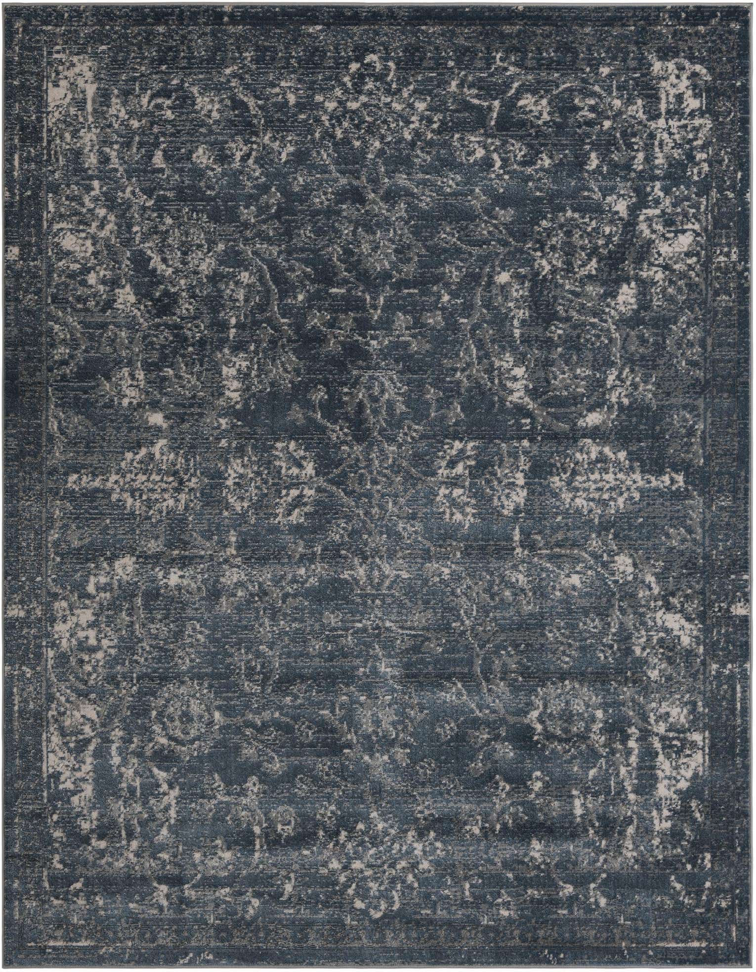 An 8x10 rectangular blue shabby-chic rug with a distressed botanical pattern and textured pile.