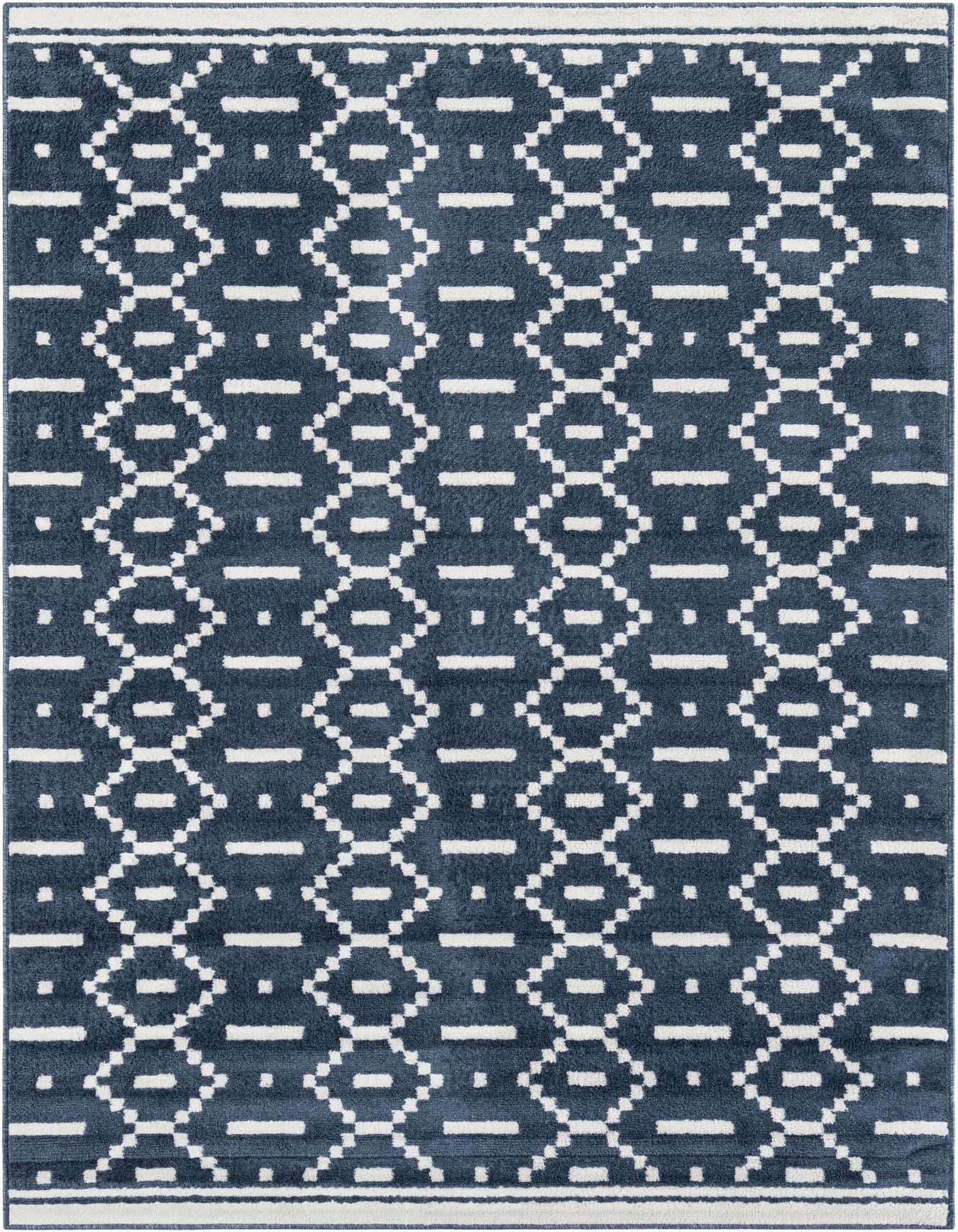 A 6x9 rectangular Oslo rug in deep blue with a modern geometric pattern of white diamonds and dashes, suitable for a living room.