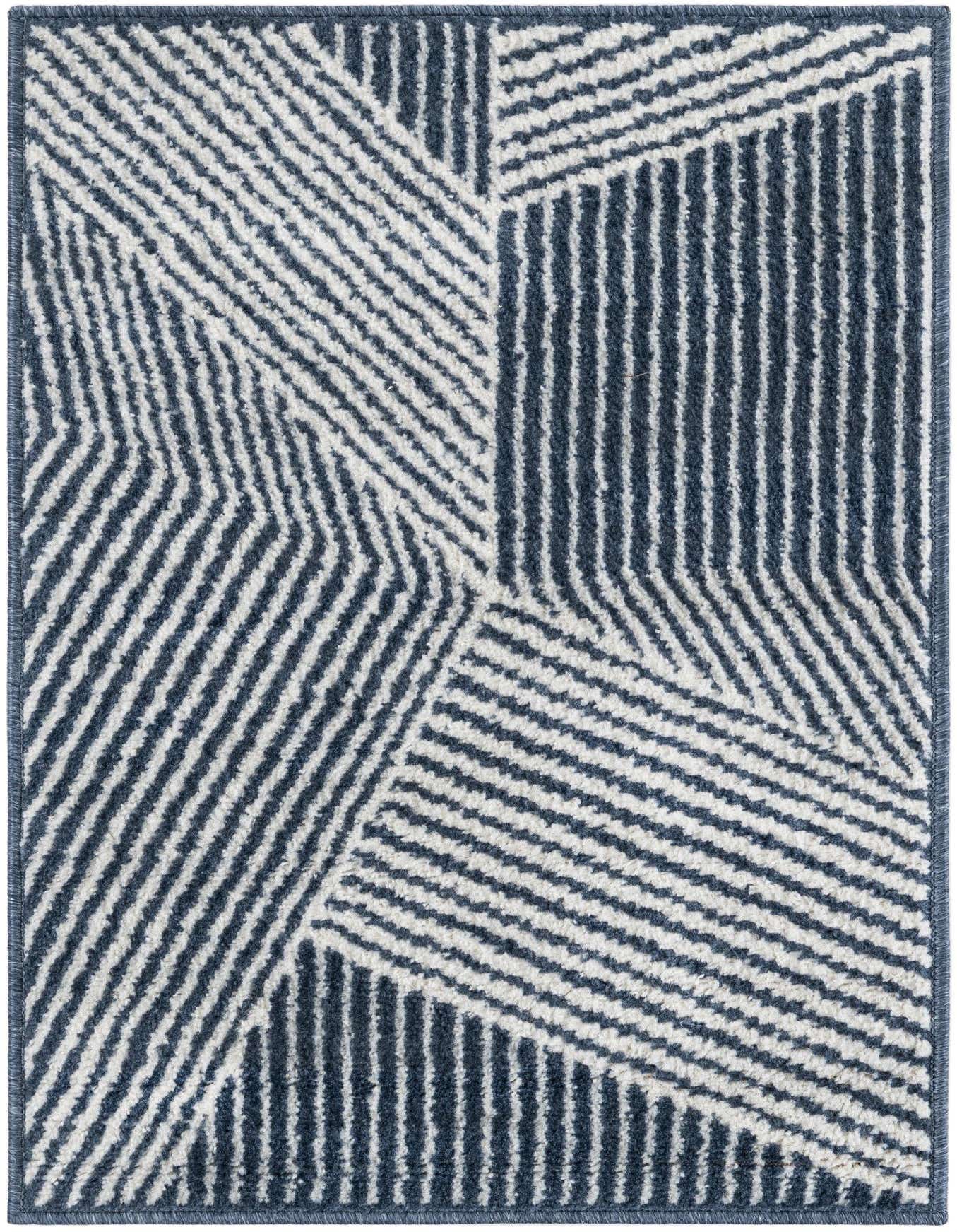 A 2x3 rectangular Oslo collection rug featuring a modern geometric stripe pattern in varying shades of blue and white.