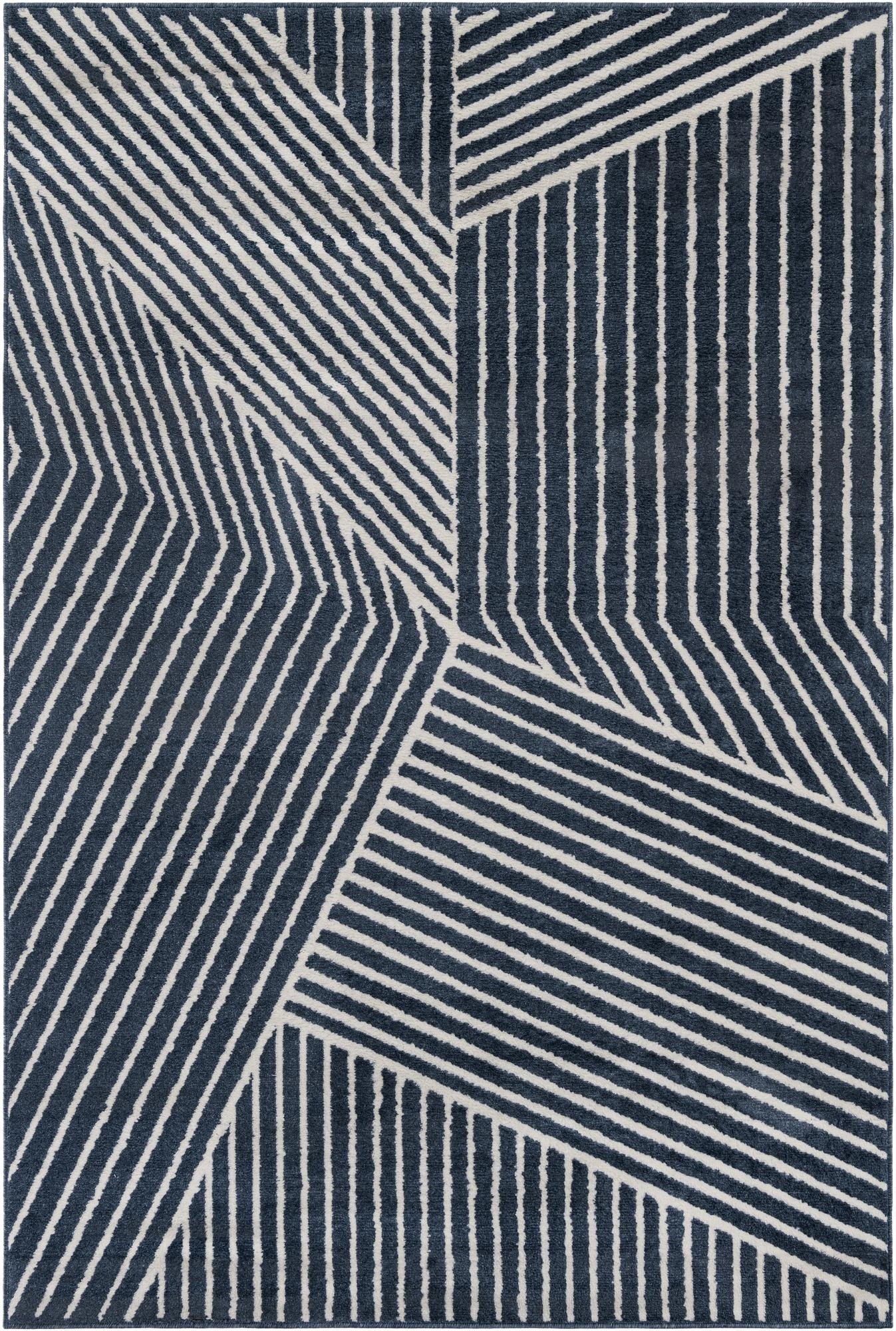 A 6x9 rectangular Oslo rug featuring a modern Scandinavian stripe pattern in varying shades of blue, ideal for a living room.