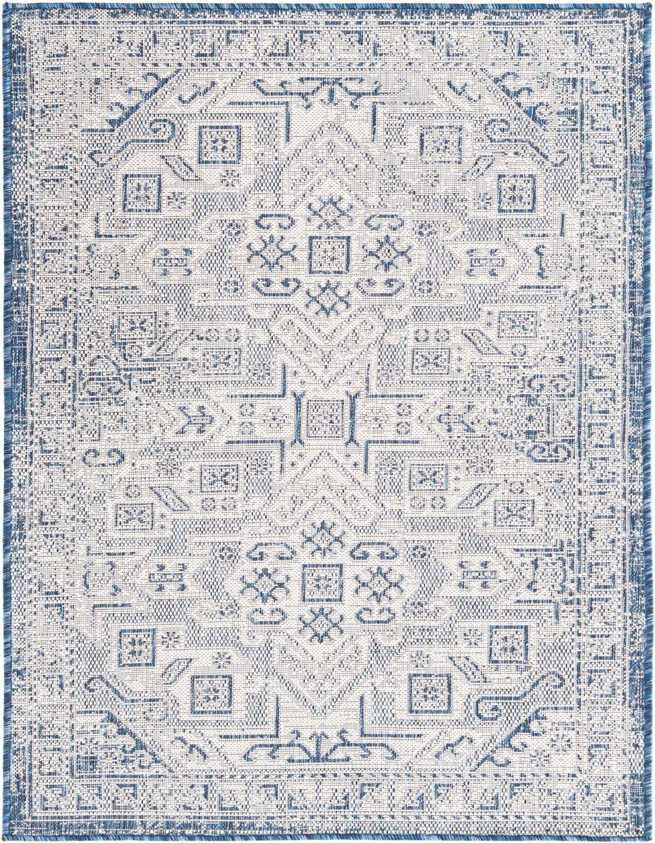 A 3x5 rectangular indoor/outdoor rug featuring a blue and white Southwestern tribal pattern with a flatweave texture.