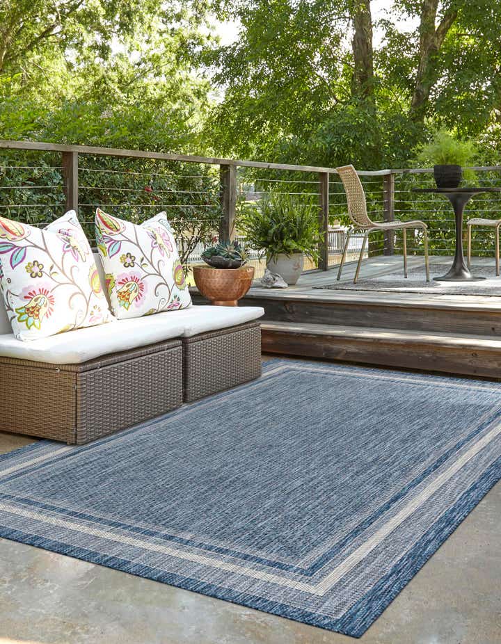Blue 7' x 10' Washable Border Indoor Outdoor Rug