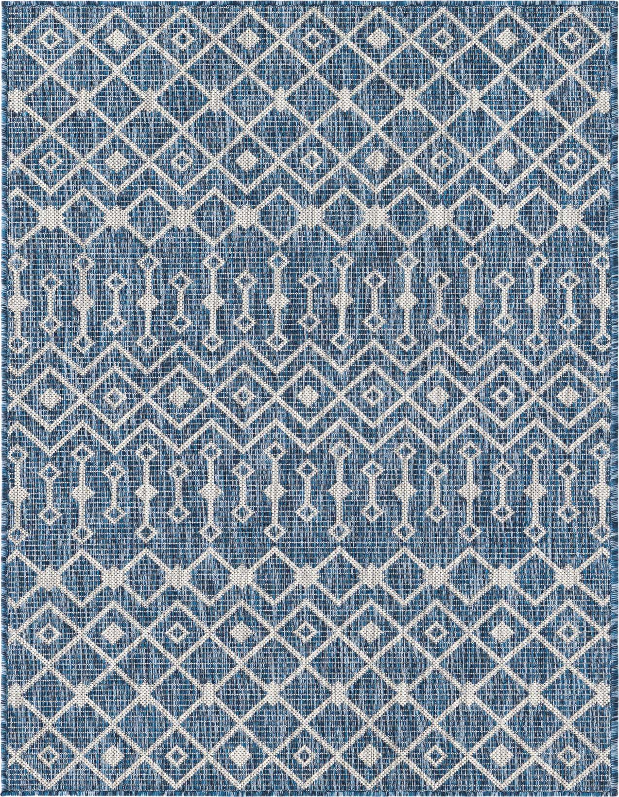 A 3x5 rectangular indoor/outdoor rug featuring a repeating tribal geometric pattern in shades of blue and white.