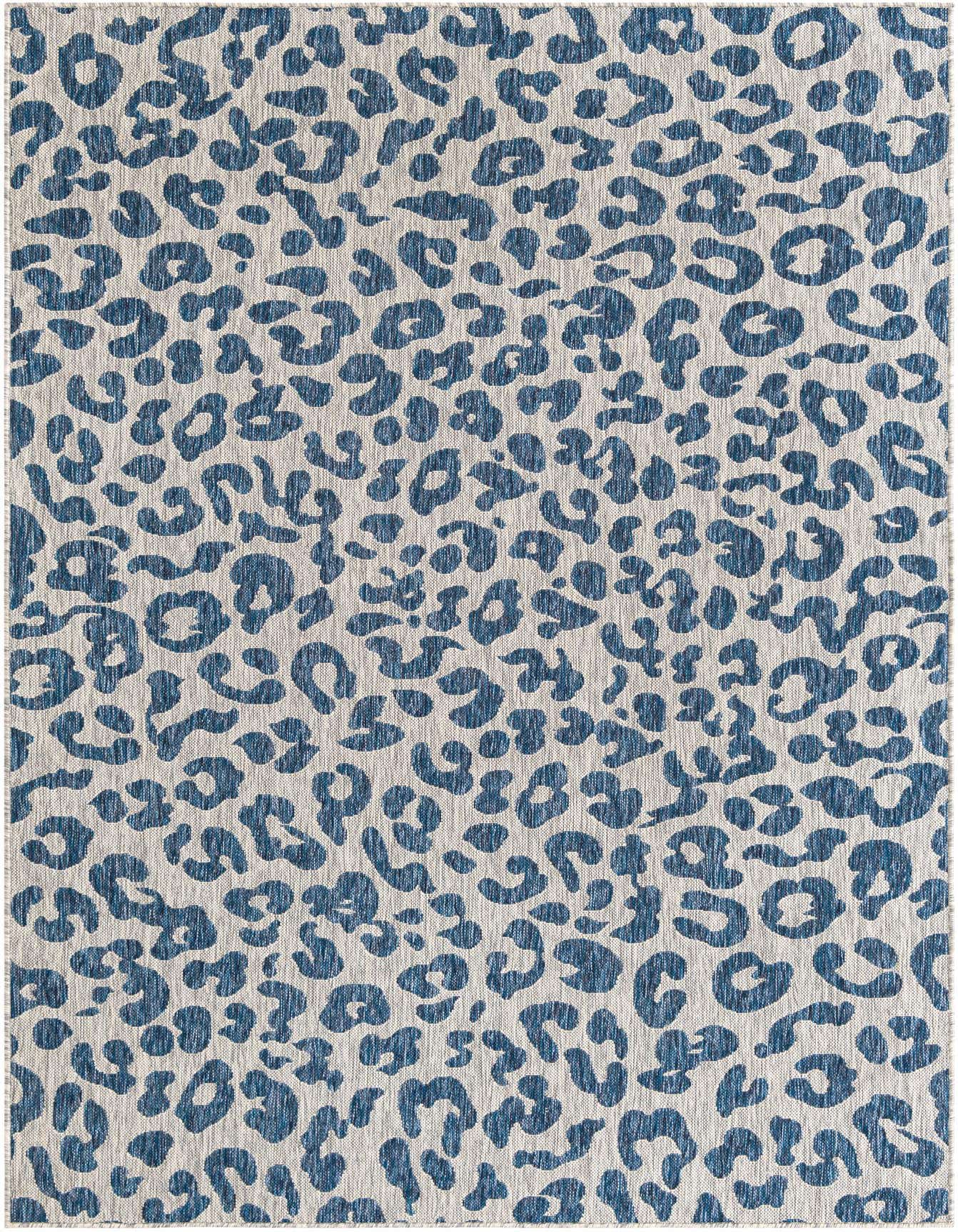 A 6x9 rectangular indoor/outdoor rug featuring a modern blue leopard print pattern on a light background.