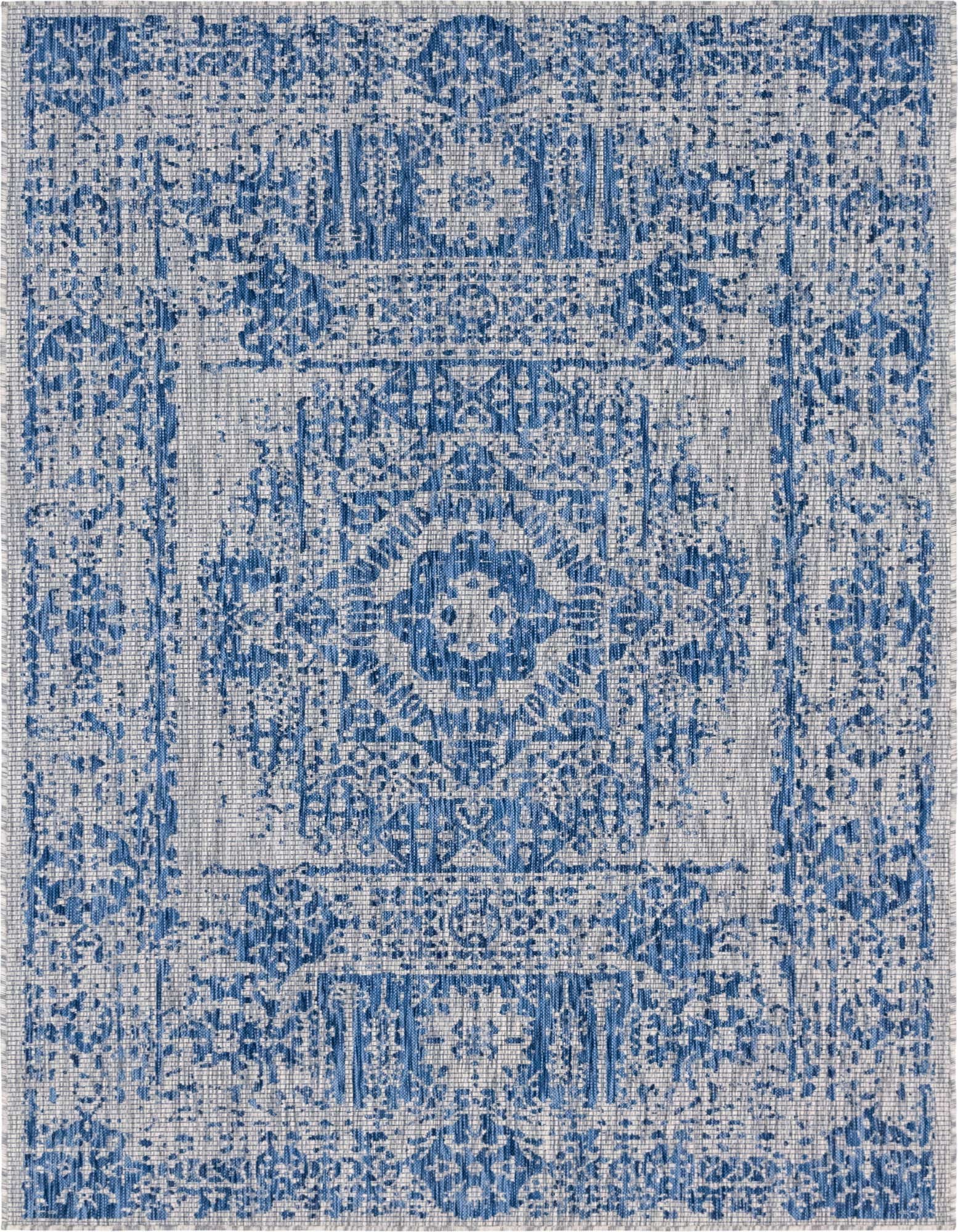 A 7x10 rectangular blue and white Southwestern-style flatweave rug with a central medallion pattern, suitable for indoor or outdoor use.