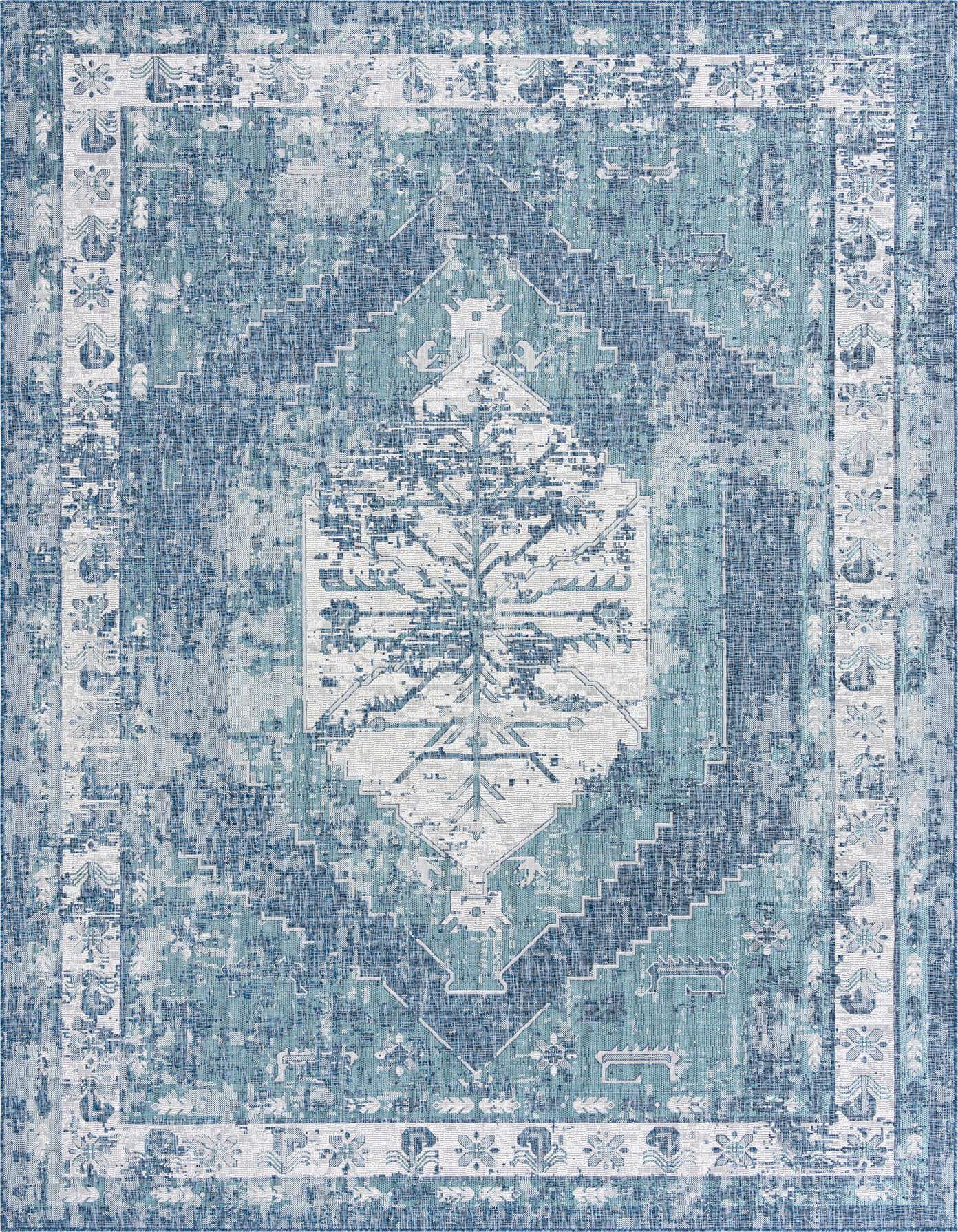 A 10x14 rectangular blue Southwestern rug with a distressed traditional pattern, ideal for a patio or indoor space.