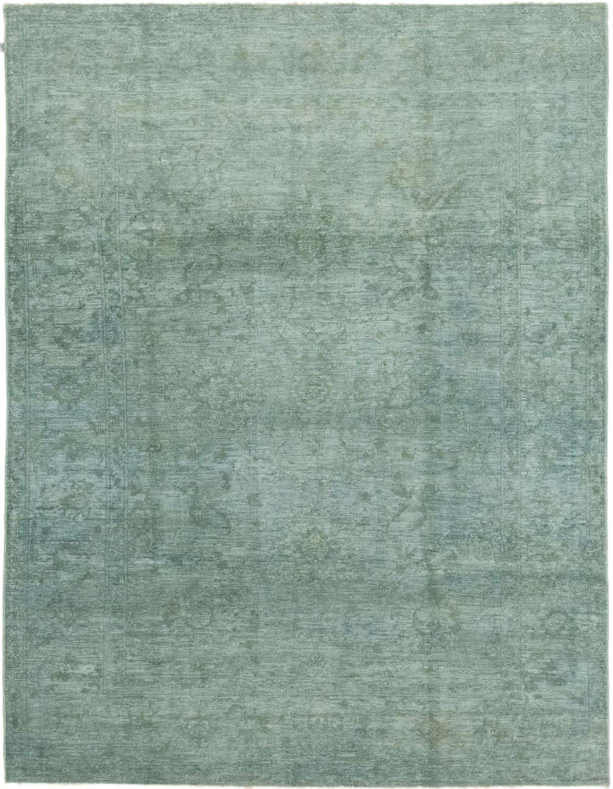 A rectangular 6x9 blue over-dyed Ziegler rug with a subtle traditional pattern, made from hand-spun wool.