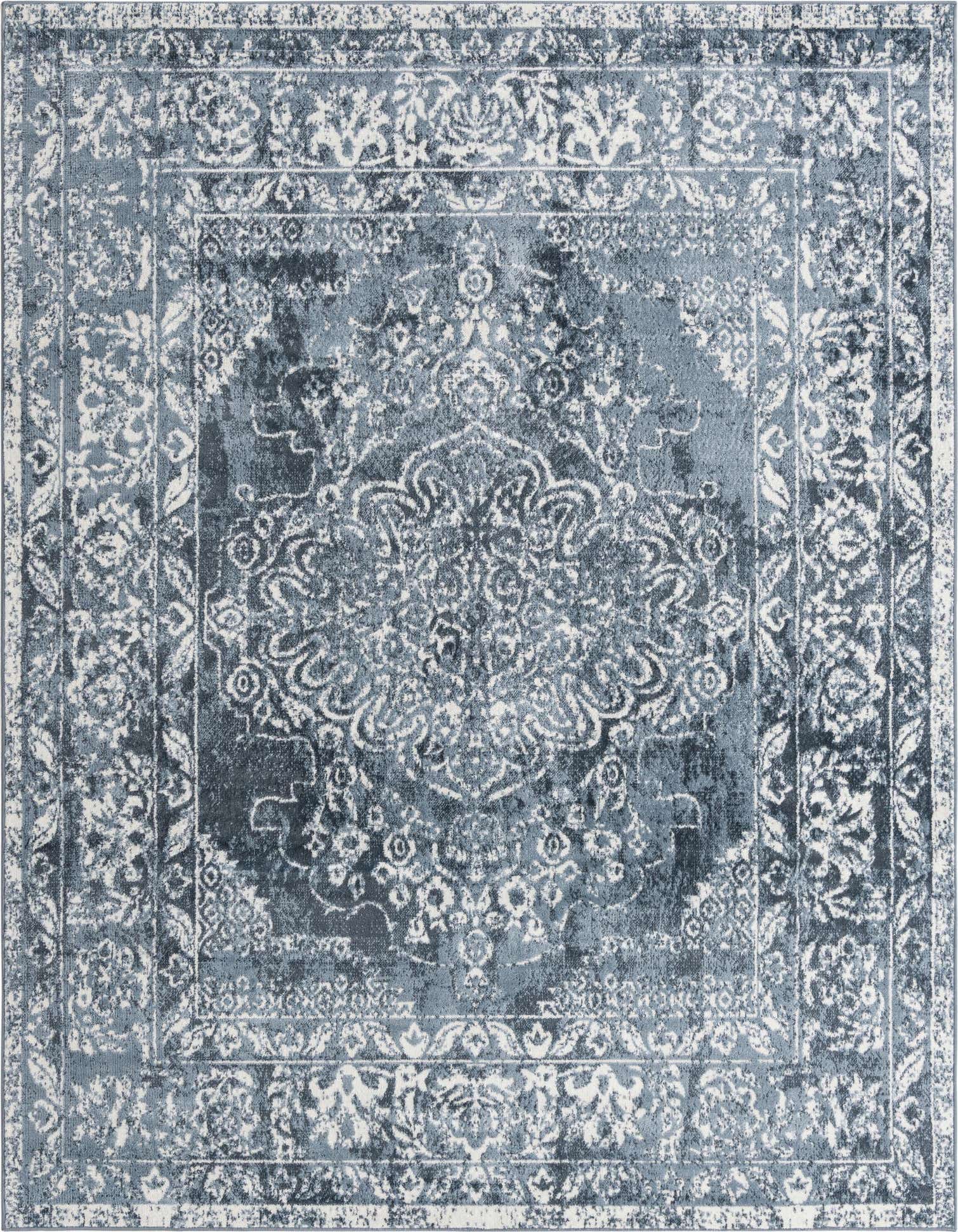 An 8x10 rectangular Oxford collection rug in varying shades of blue with a distressed traditional medallion pattern.