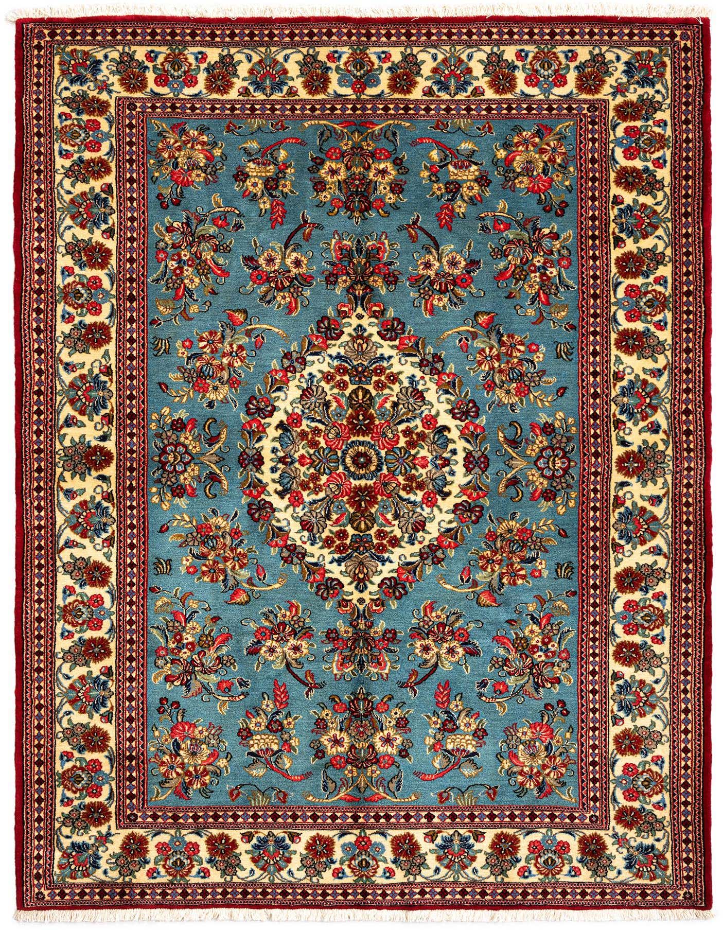 A 5x7 rectangular Persian rug with a blue field, intricate floral patterns in red, gold, and blue, and a detailed cream border.