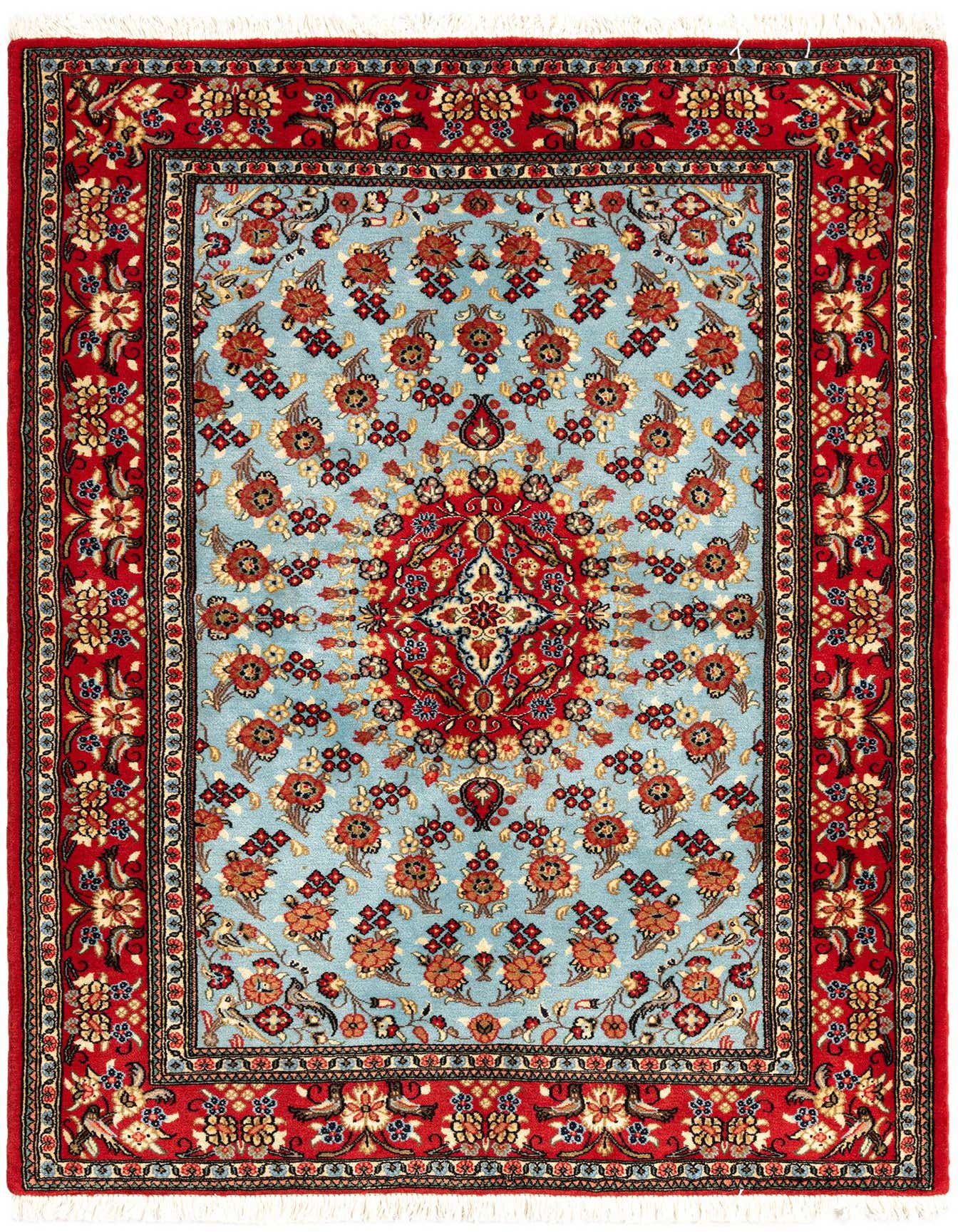 A 3x5 rectangular Persian rug with a light blue field, red border, and intricate floral patterns.