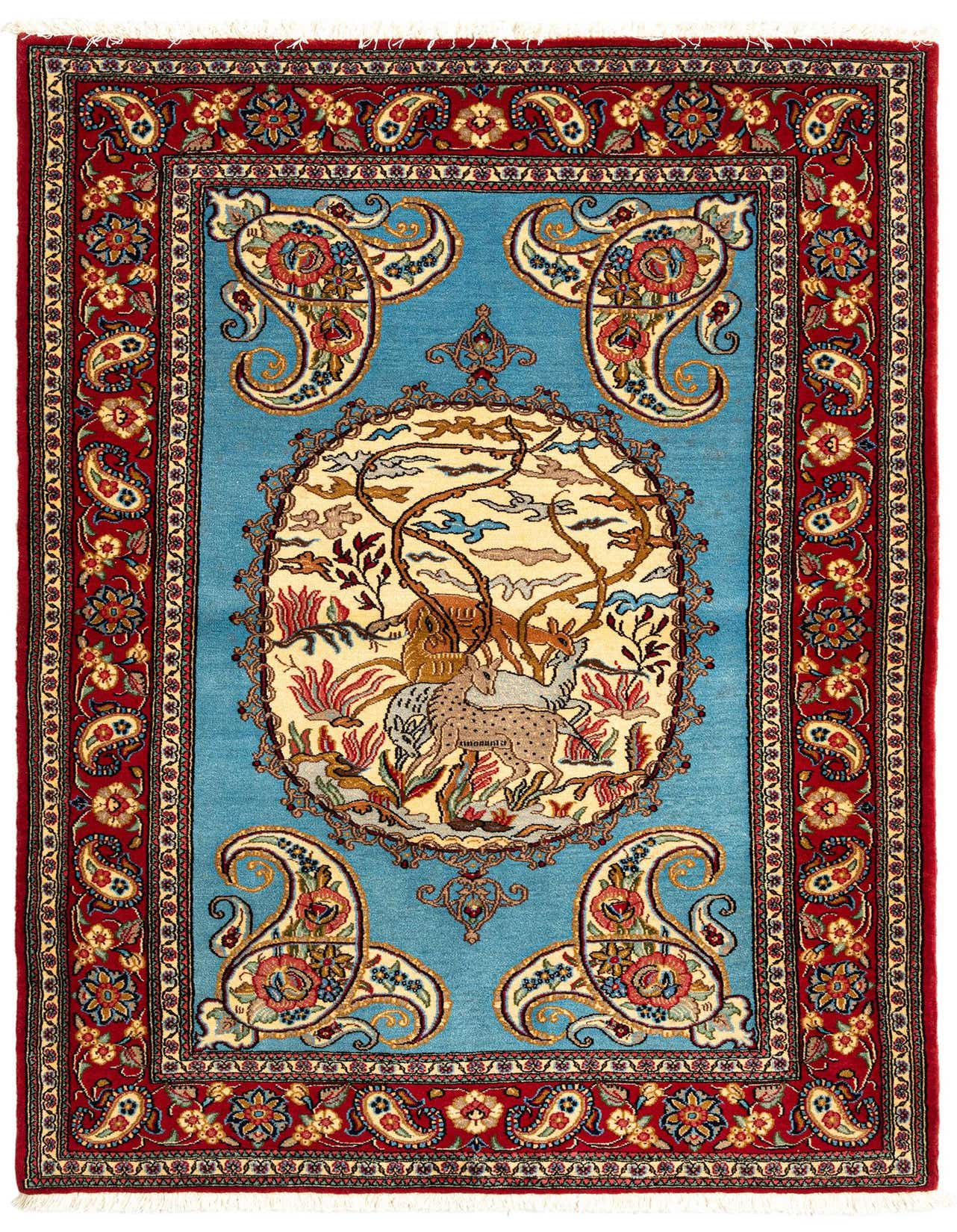 A 3x5 rectangular Persian rug with a vibrant blue field and a detailed red border, featuring an oval medallion with deer and trees.