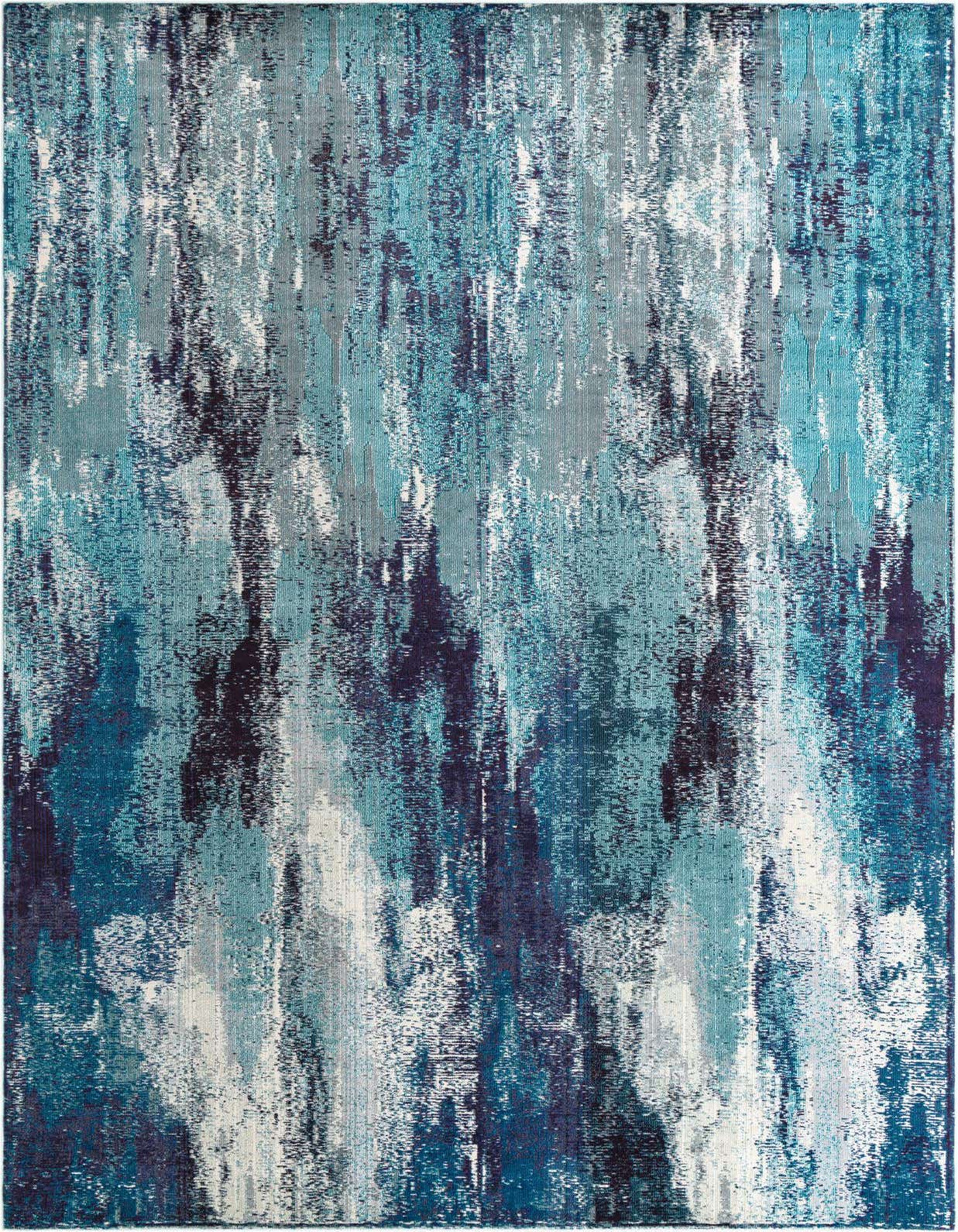 A rectangular blue transitional area rug with an abstract, painterly pattern of various blue, teal, and white tones.