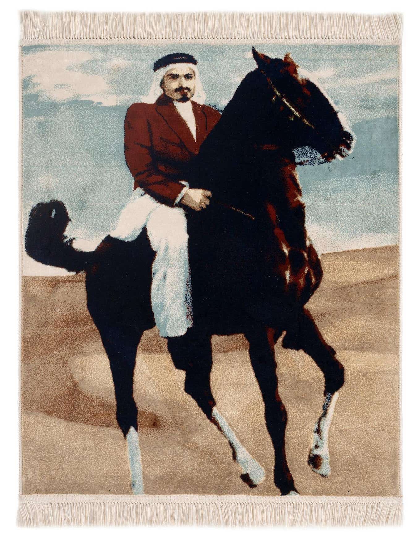 A rectangular 2x3 blue Persian rug featuring a man in traditional attire riding a dark horse across a desert landscape.