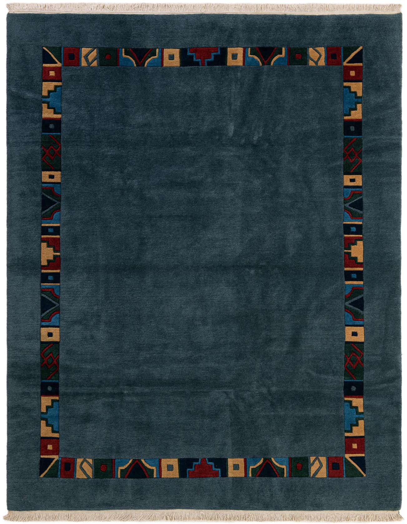 A 6x9 rectangular blue wool rug with a colorful modern Oriental border featuring abstract geometric shapes in red, gold, and teal.