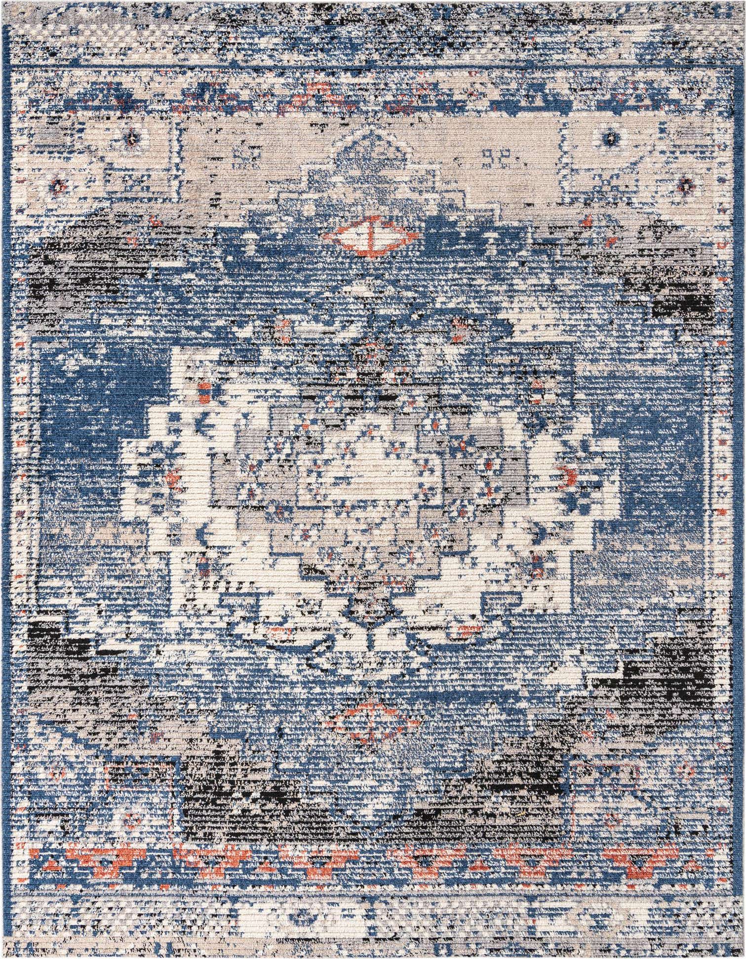 A 9x12 rectangular Tucson shag rug featuring a distressed traditional medallion pattern in various blues, beige, black, and hints of orange.