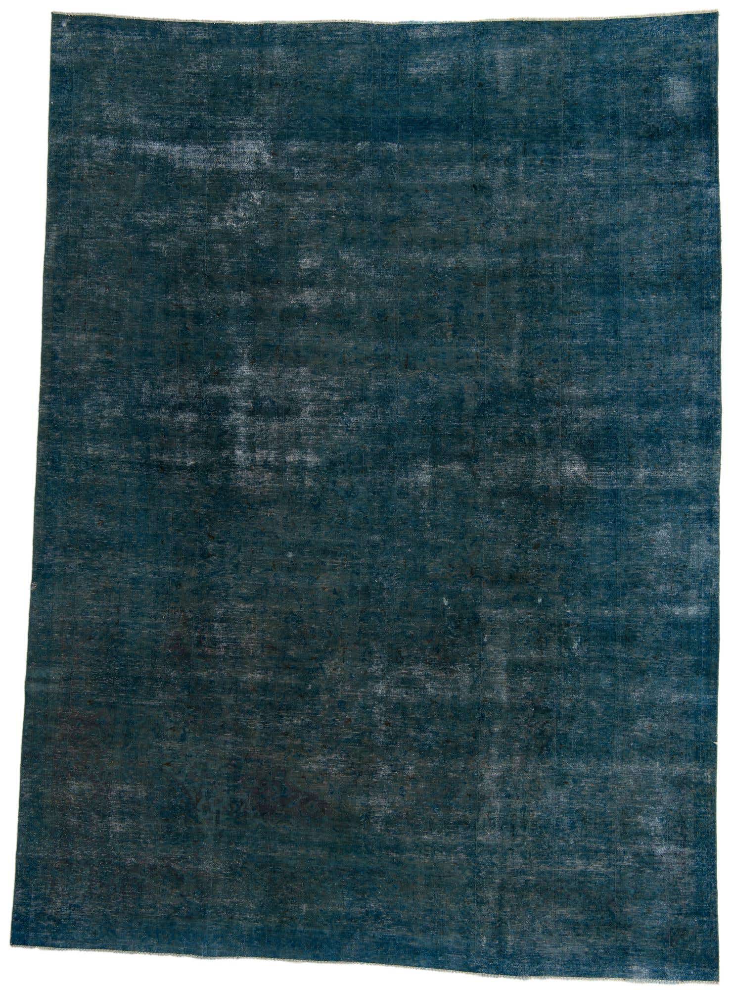 A 9x12 rectangular Ultra Vintage rug in varying shades of blue, featuring a distressed Persian-inspired pattern.