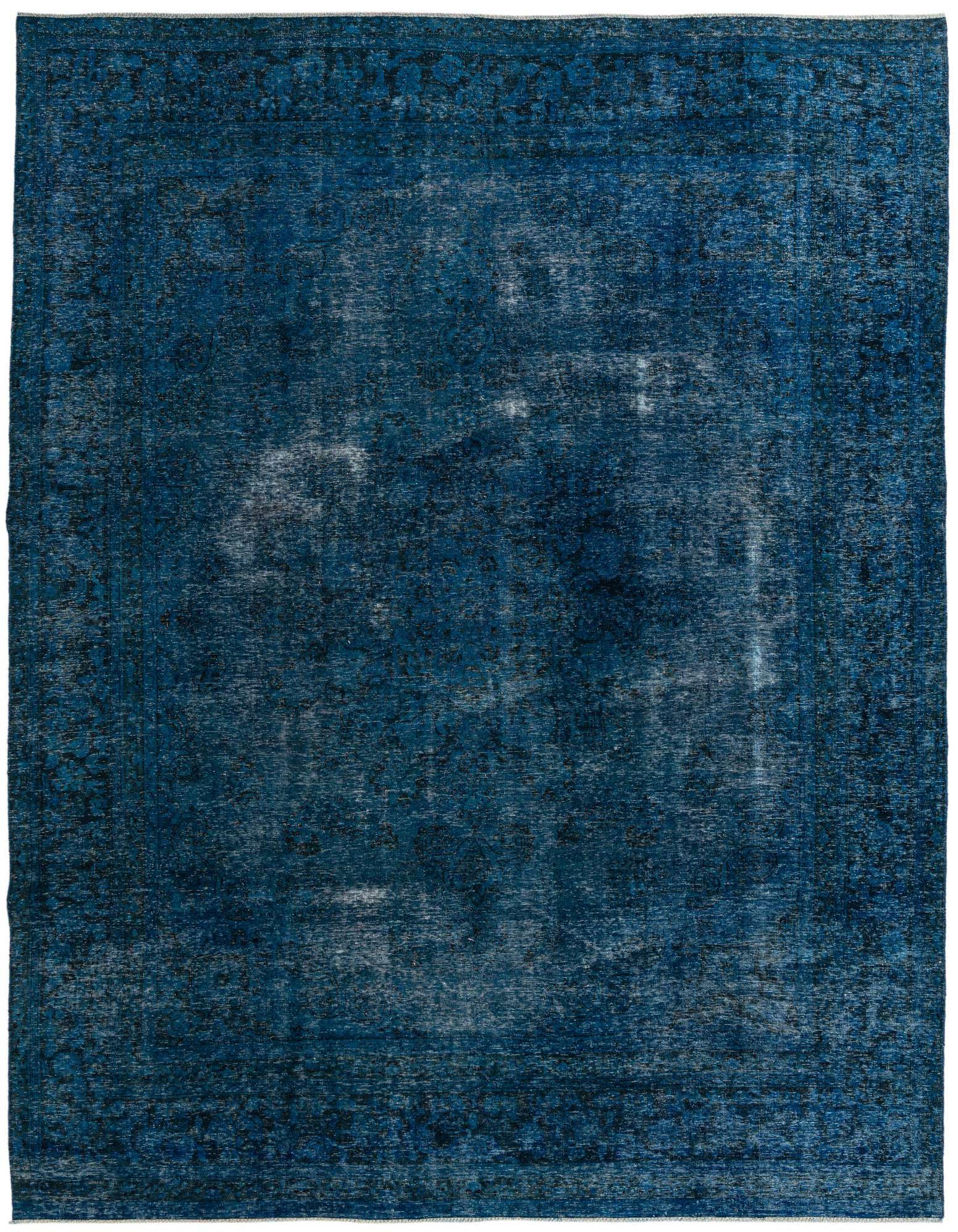 A 9x12 rectangular Ultra Vintage wool rug in deep blue with a faded Persian-inspired pattern, ideal for a living room.