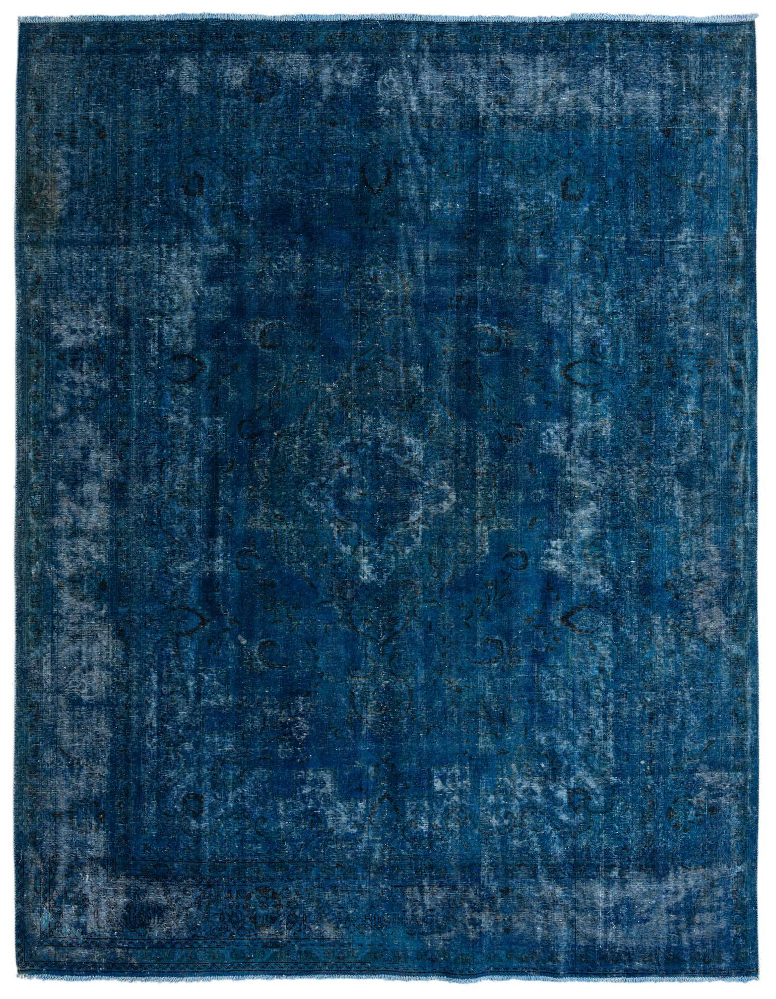A large 9x12 rectangular blue vintage Persian area rug with a faded, distressed pattern, suitable for a living room.