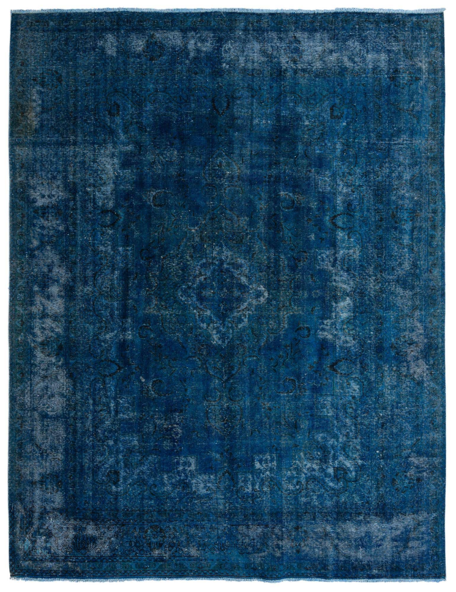 A large 9x12 rectangular blue vintage Persian area rug with a faded, distressed pattern, suitable for a living room.