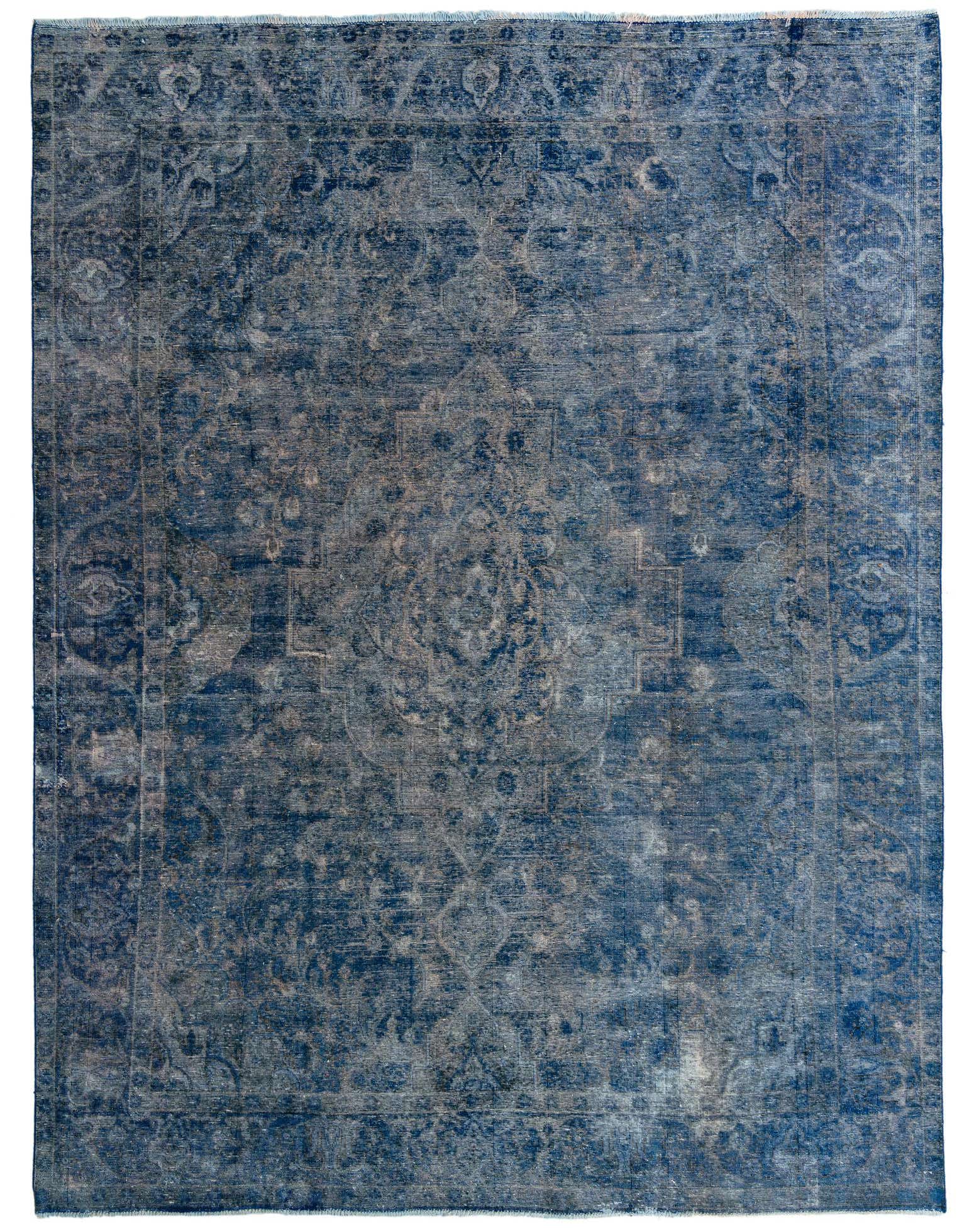 A large 10x13 rectangular blue Persian-style wool rug with a distressed vintage medallion pattern.