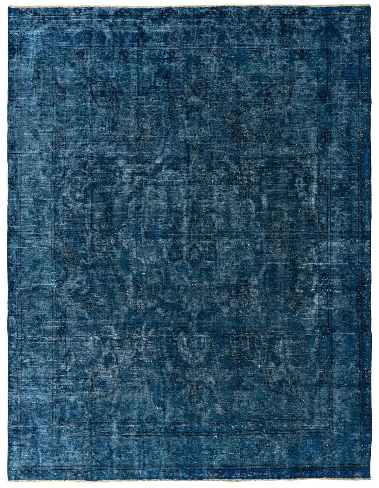 An 8x11 rectangular blue Persian-style wool rug with a distressed, vintage look and subtle floral patterns.