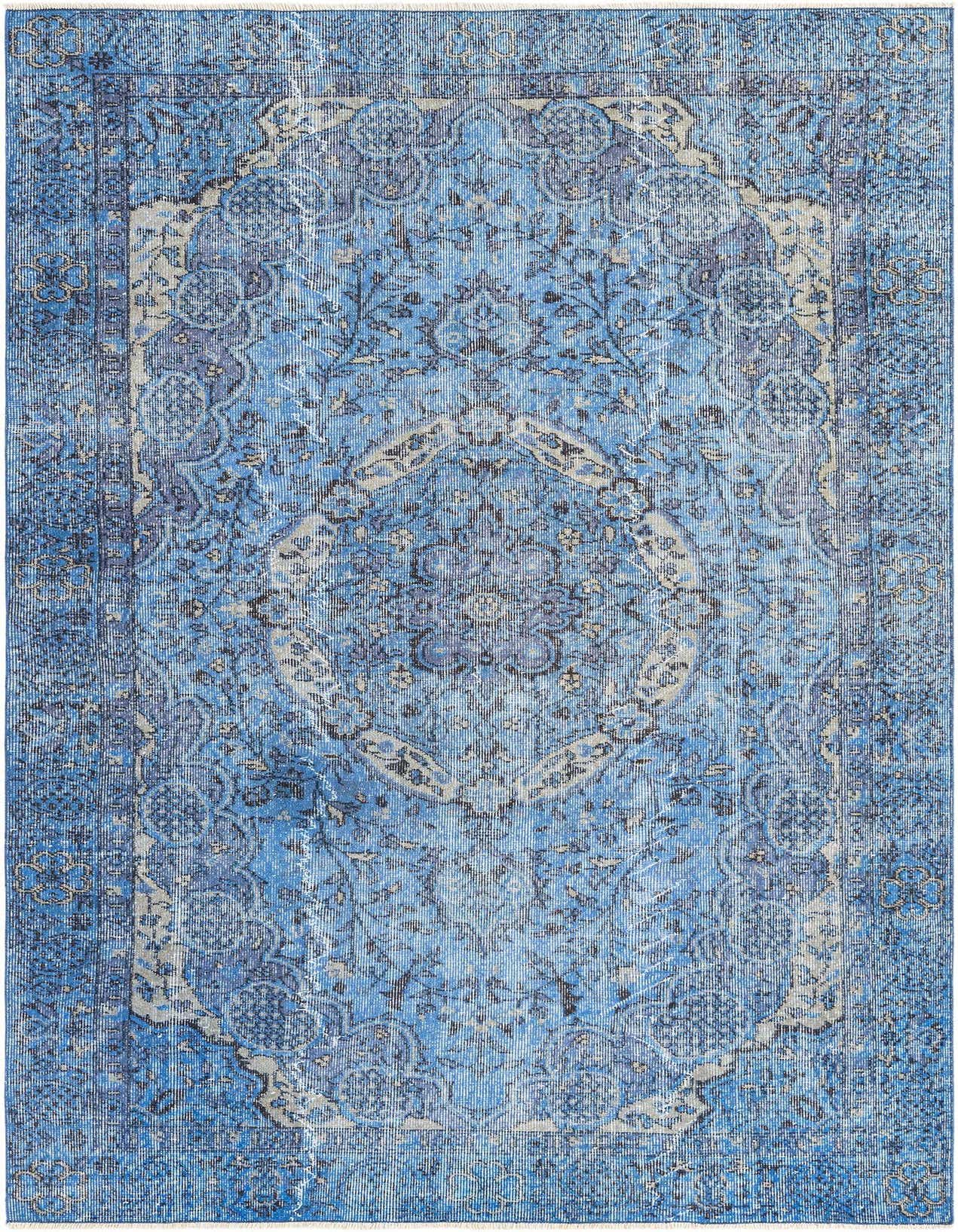 A 5x8 rectangular blue wool rug with a distressed Persian medallion pattern, perfect for a living room.