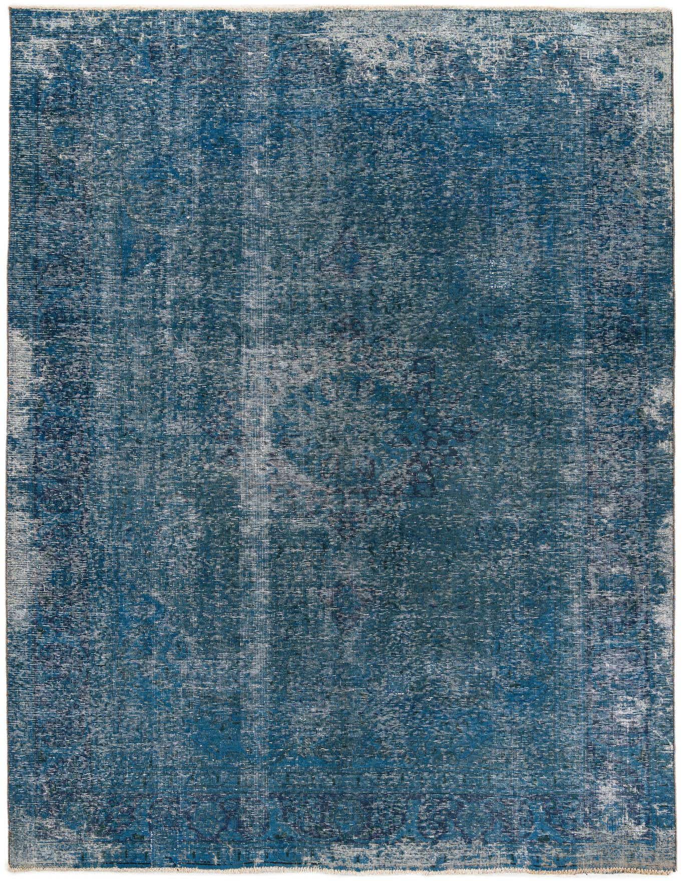 A 7x10 rectangular blue Persian-style rug with a distressed vintage medallion pattern, suitable for a living room.