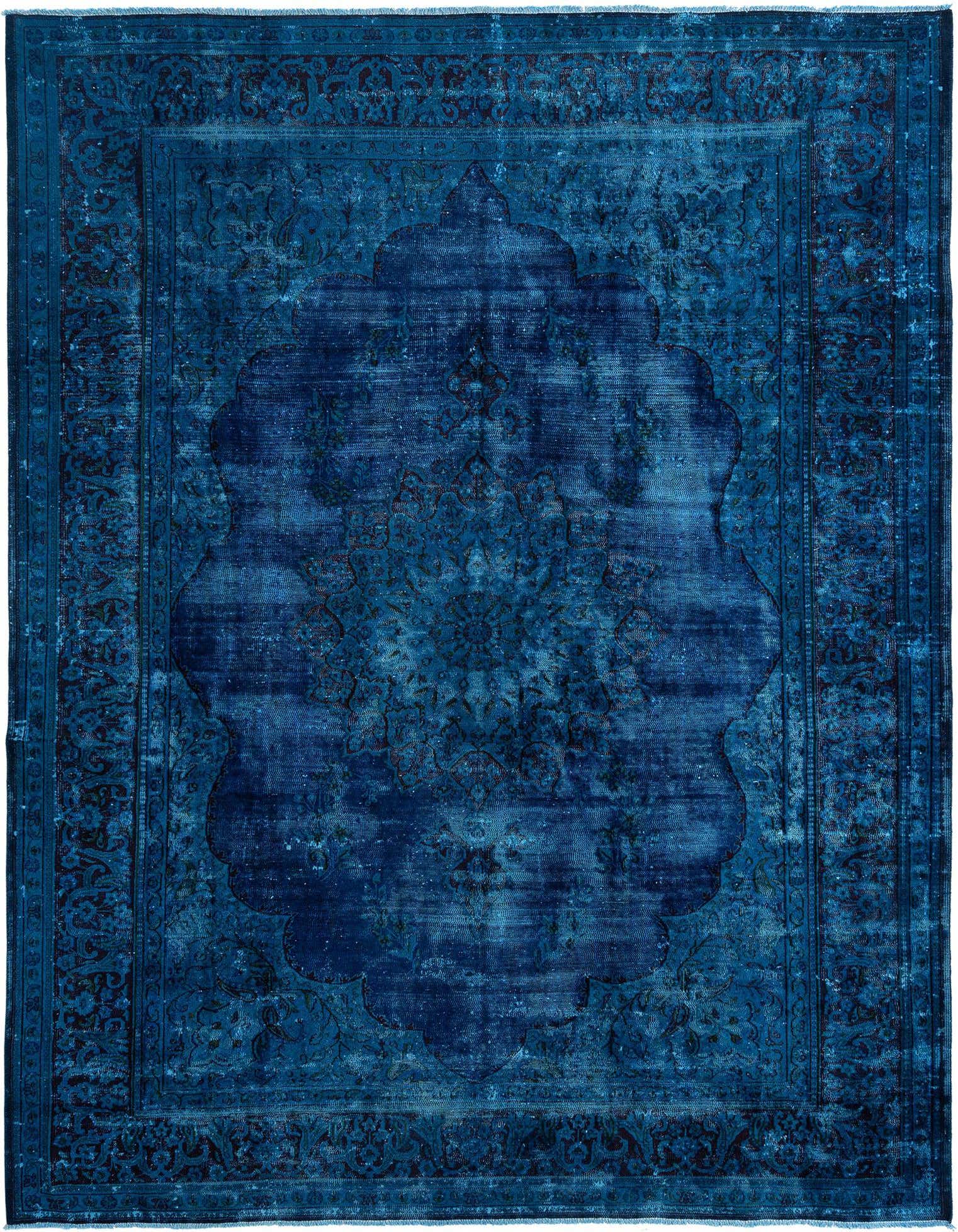 An 8x11 rectangular blue Persian wool rug with a distressed vintage look and intricate floral medallion pattern.