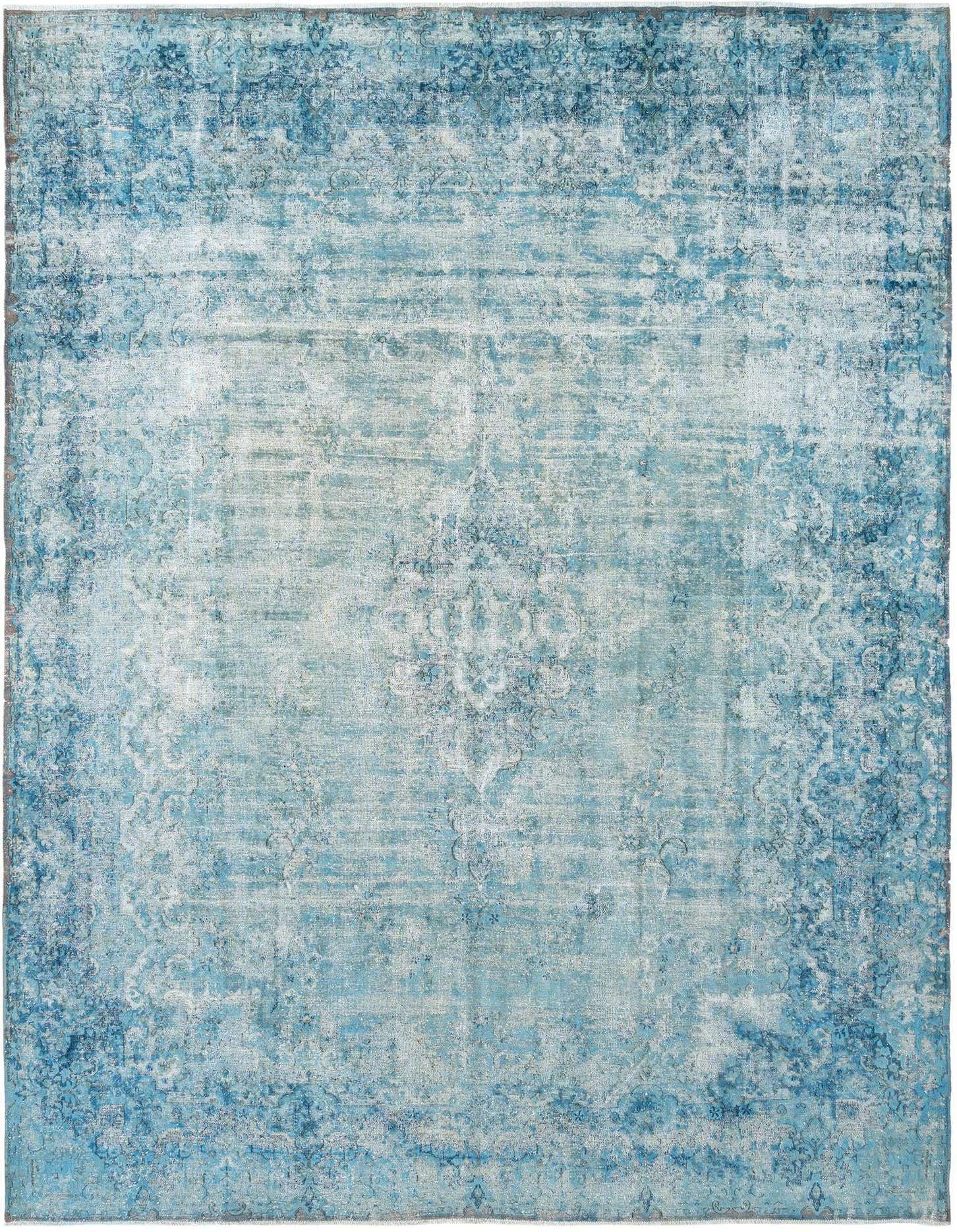 A 10x13 rectangular blue Persian area rug with a distressed, faded pattern, suitable for a living room.