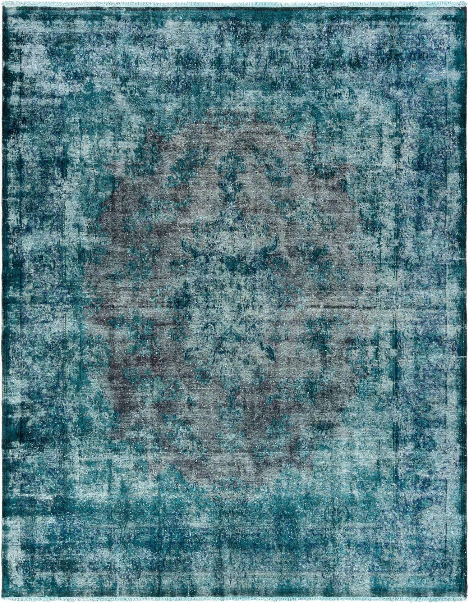 A 10x13 rectangular Rugs.com Vintage Royal Persian rug in varying shades of blue, featuring a distressed traditional pattern with a central medallion.