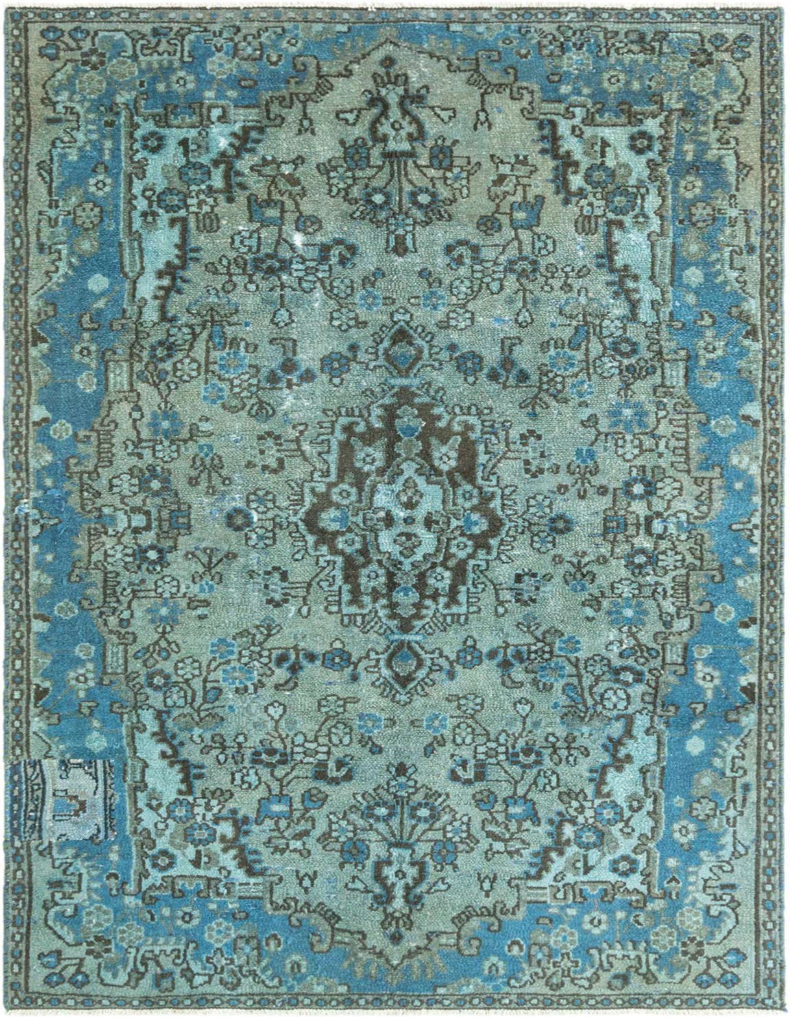 A 3x5 rectangular Vintage Royal rug in varying shades of blue, featuring a distressed traditional pattern.