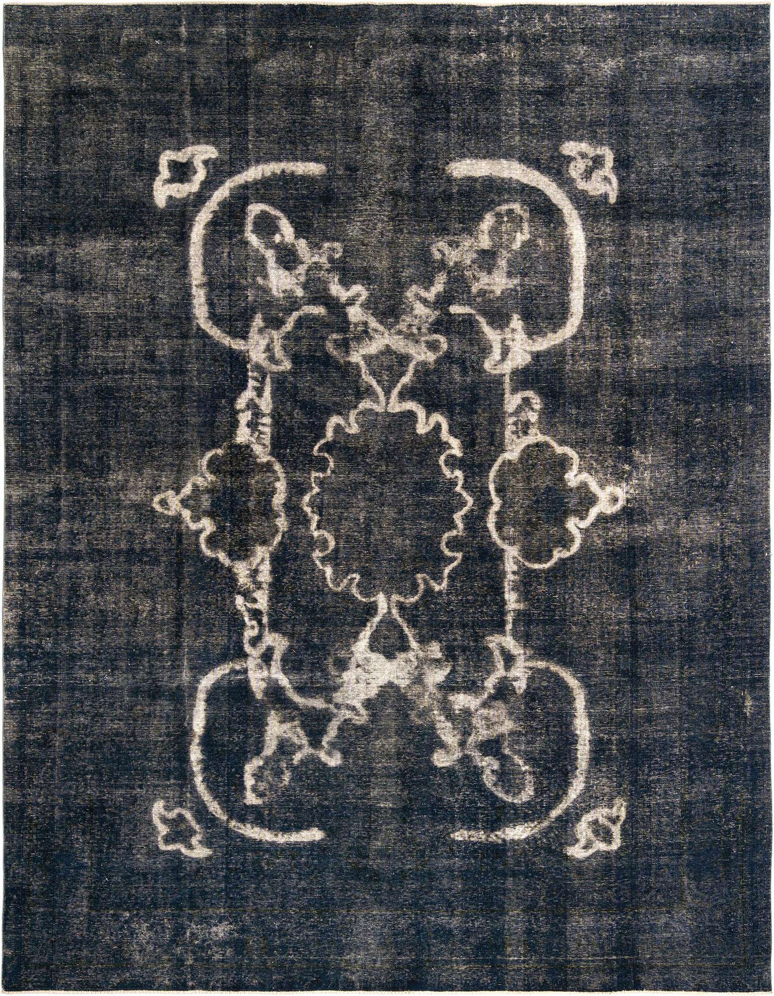 A 10x13 rectangular blue Persian wool rug with a distressed white ornate medallion and border pattern.