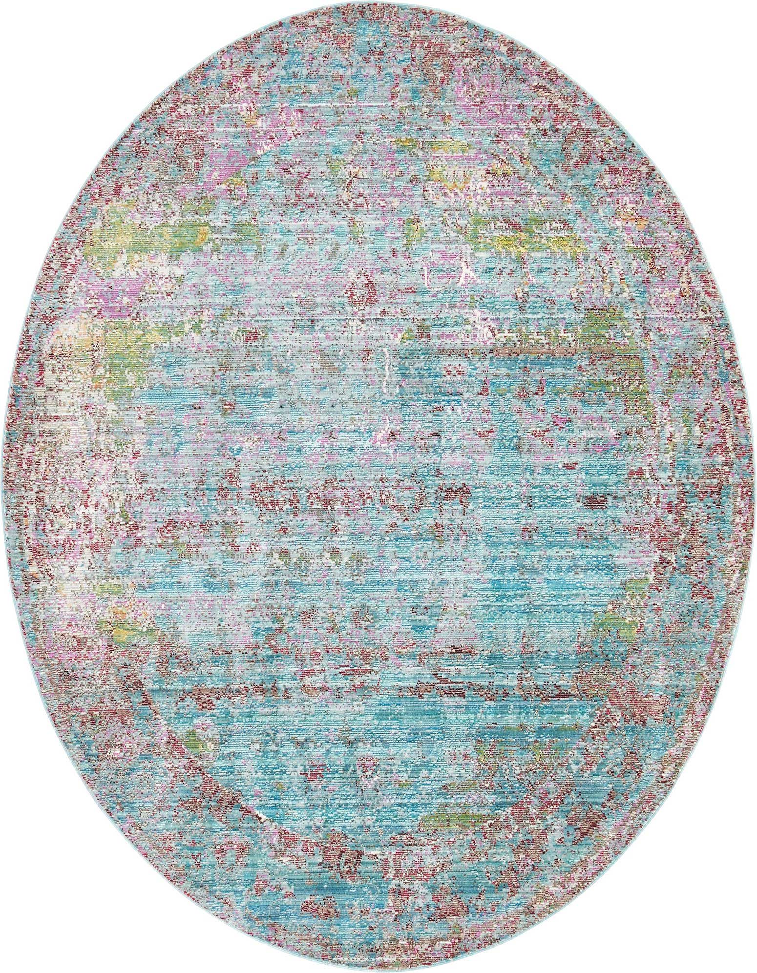 A round 6' blue bohemian rug with distressed pink, green, and yellow abstract patterns, suitable for indoor spaces.