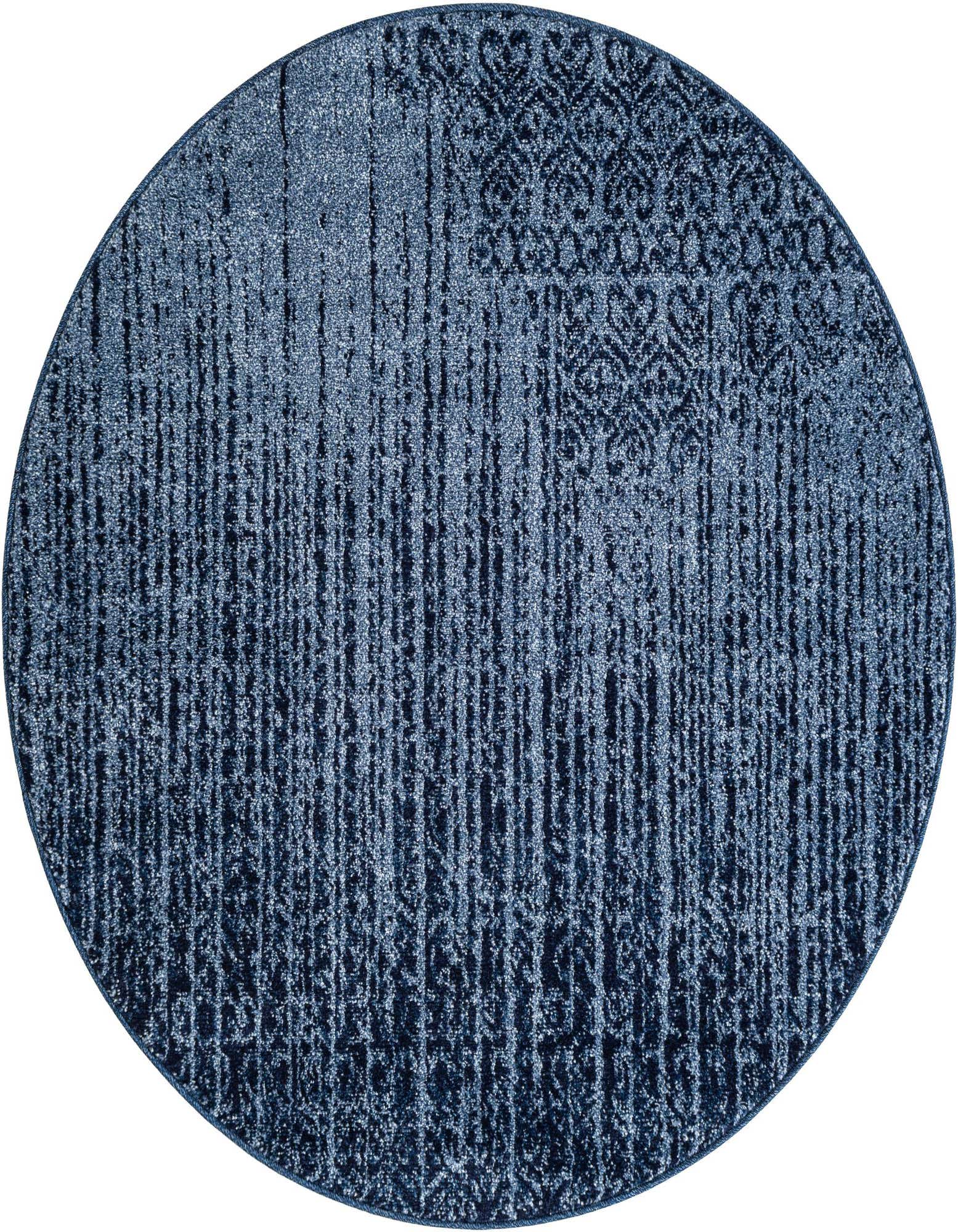 A 4' round blue transitional rug with an abstract distressed pattern and subtle vintage medallions.