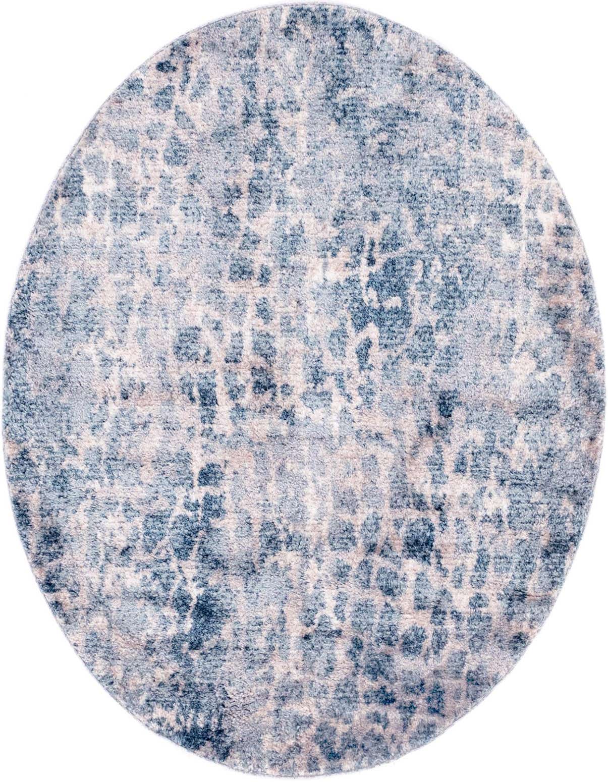 A round 4' 7 x 4' 7 Rugs.com Artemis rug featuring an abstract bohemian pattern in varying shades of blue and light grey, showcasing its textured pile.